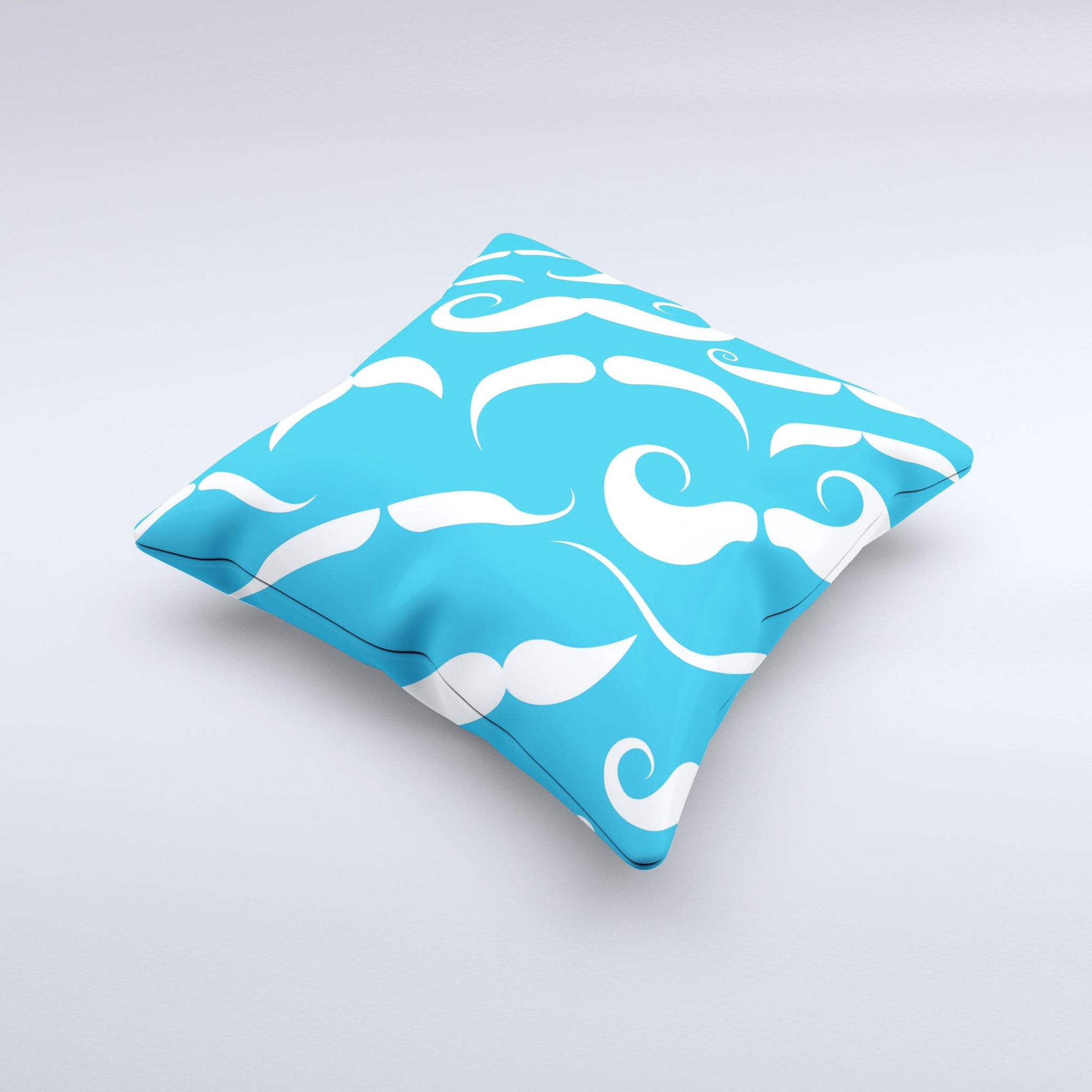 A decorative throw pillow featuring white mustaches on a vibrant blue background, showcasing a unique handmade design.