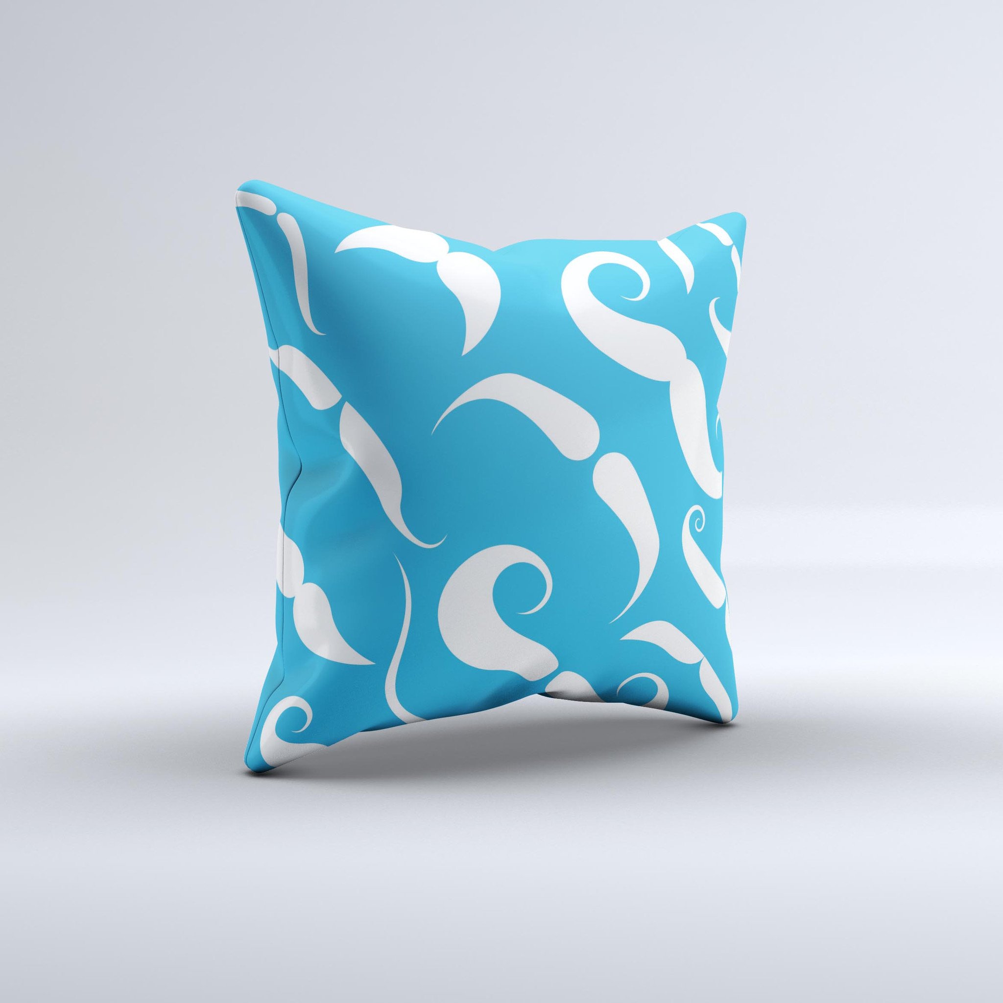 A decorative throw pillow featuring white mustaches on a vibrant blue background, showcasing a unique handmade design.