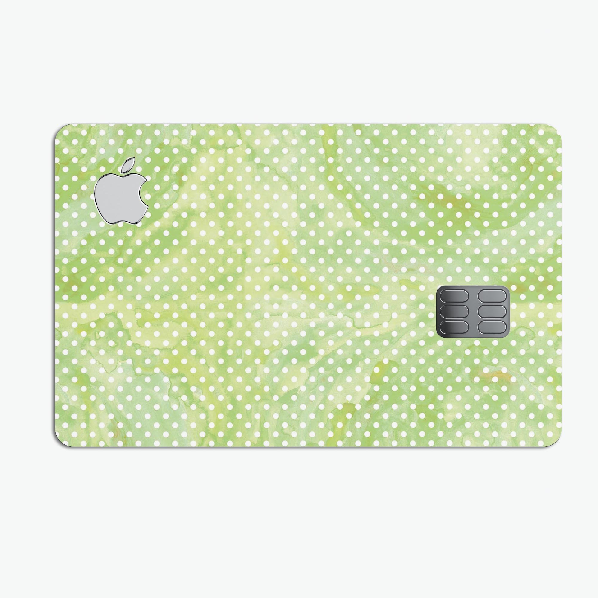 White Polka Dots over Green Watercolor V2 decal applied on an Apple Card, showcasing its stylish design and premium quality.