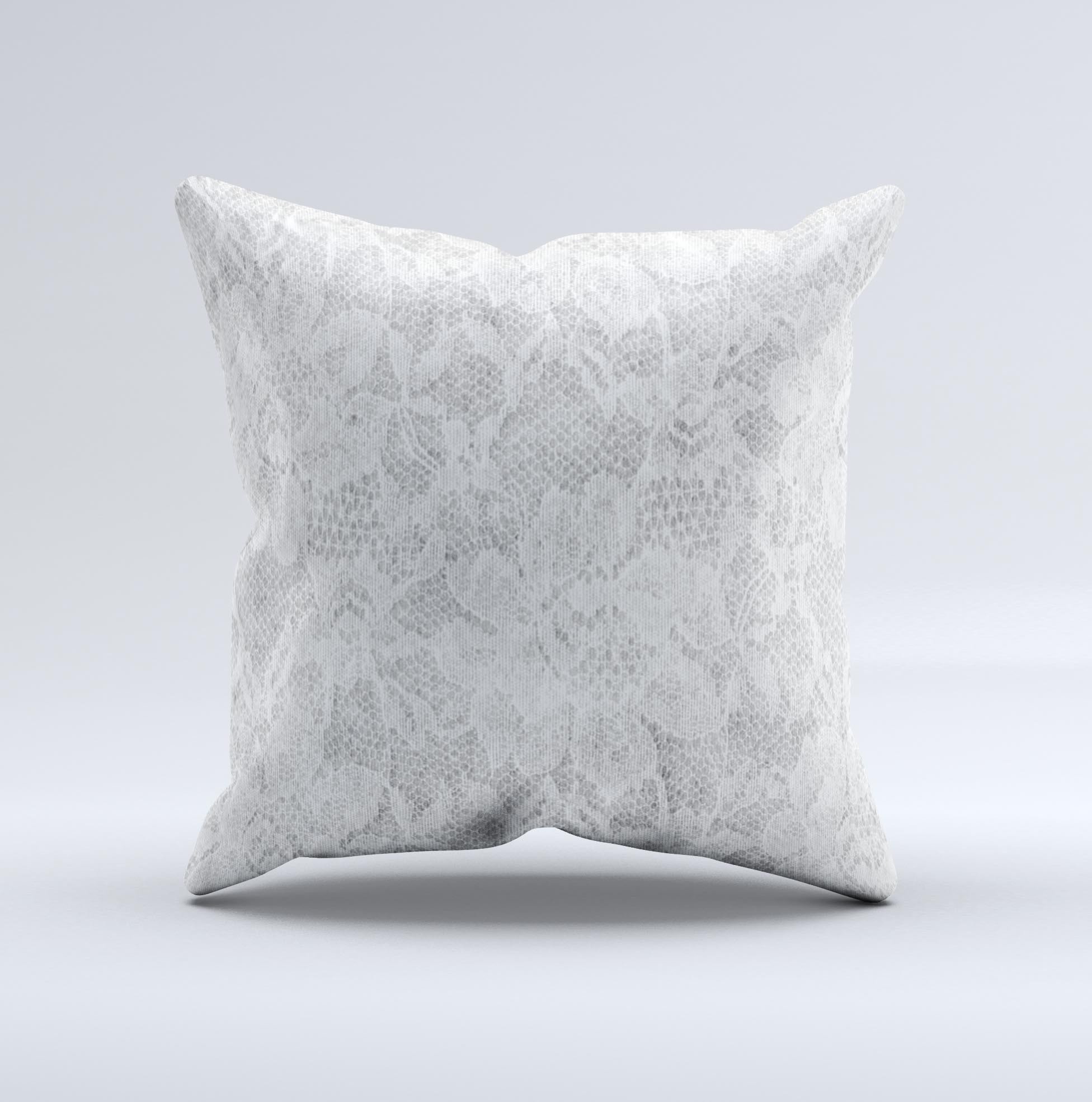 A beautifully handcrafted white textured lace decorative throw pillow with intricate ink-fuzed design, showcasing its unique and artisanal quality.