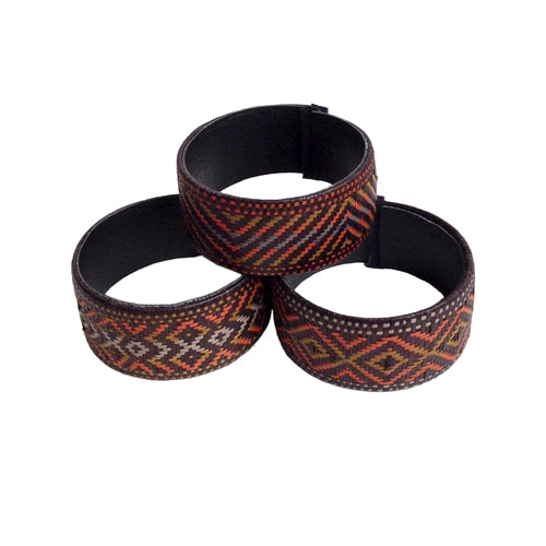 Wide Cana Flecha Bracelet handcrafted from sustainable Caña Flecha by Zenu Tribe artisans in Colombia, featuring intricate geometric patterns.