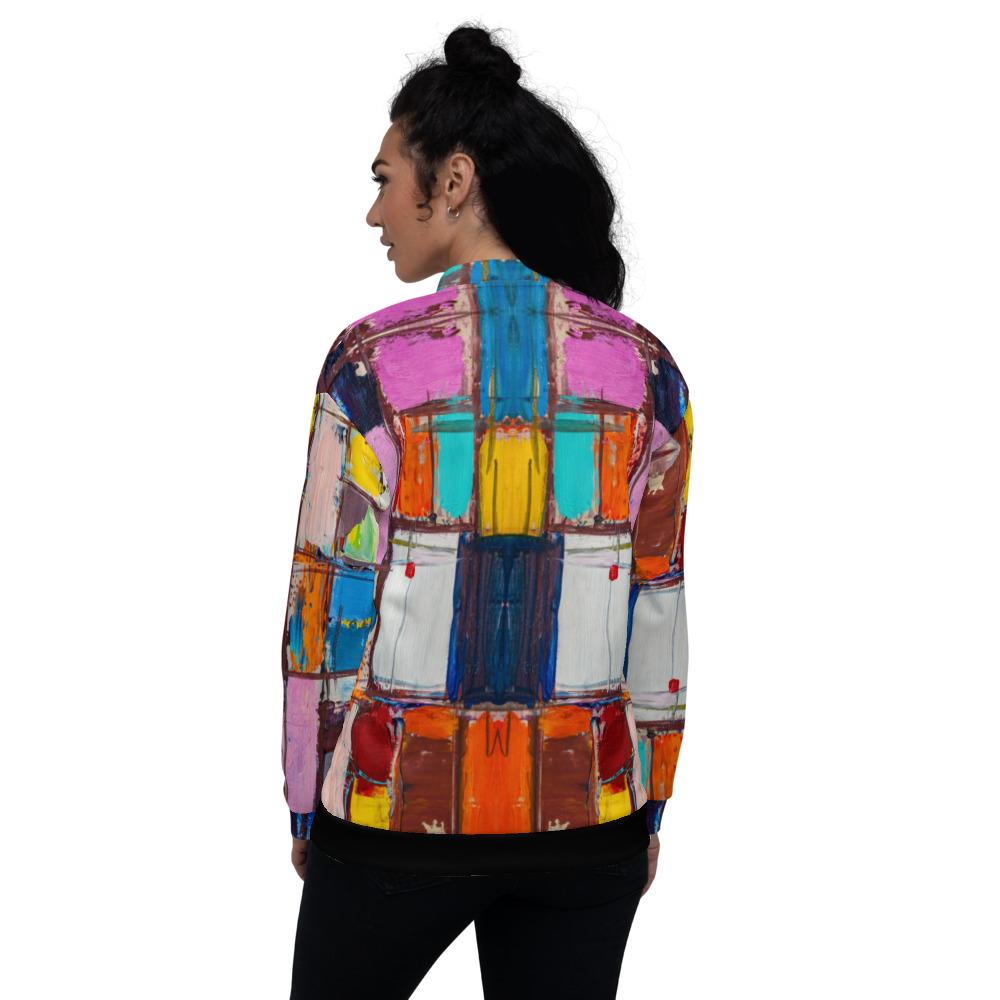 Women's Bomber Jacket featuring a vibrant abstract multicolor block design, showcasing its brushed fleece interior and stylish fit.