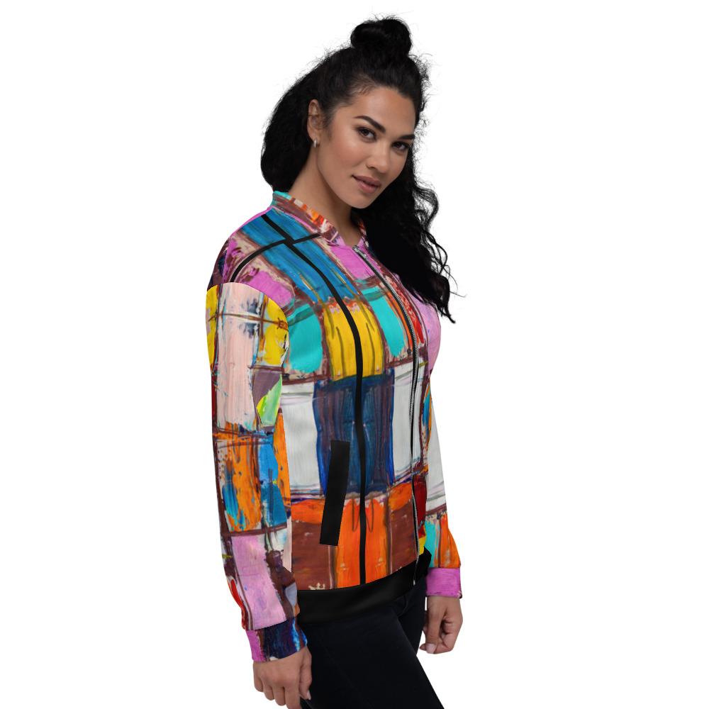 Women's Bomber Jacket featuring a vibrant abstract multicolor block design, showcasing its brushed fleece interior and stylish fit.