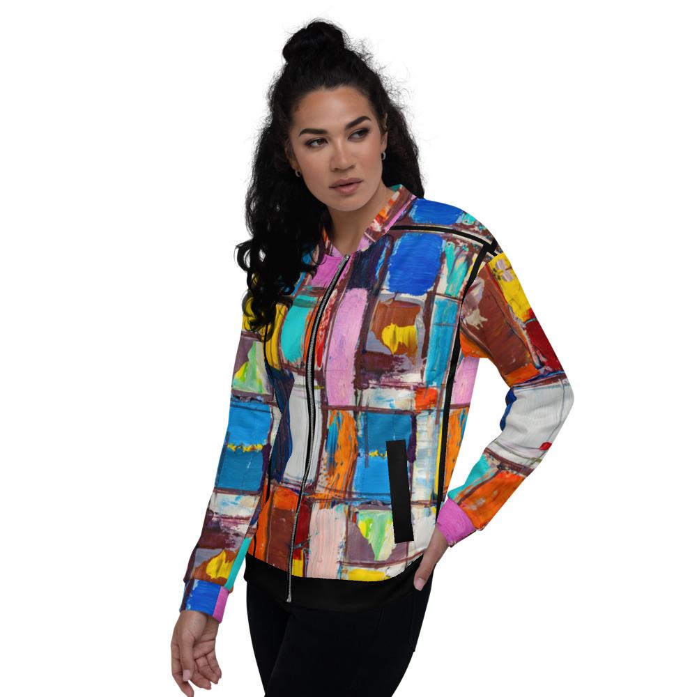 Women's Bomber Jacket featuring a vibrant abstract multicolor block design, showcasing its brushed fleece interior and stylish fit.