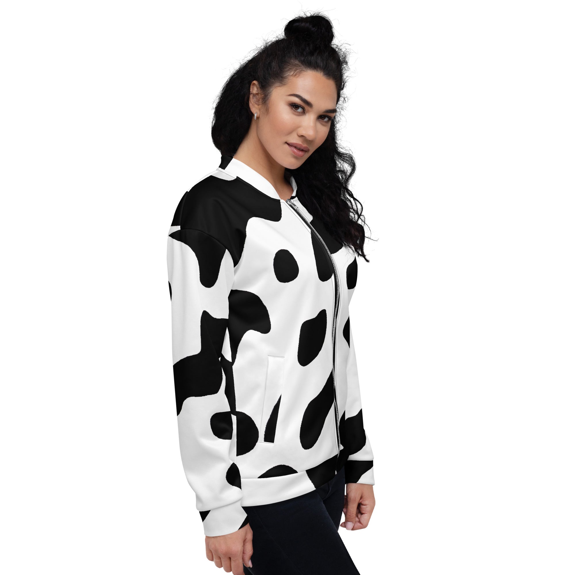 Women's bomber jacket featuring a stylish black and white cow print design, zip-front closure, and ribbed cuffs.