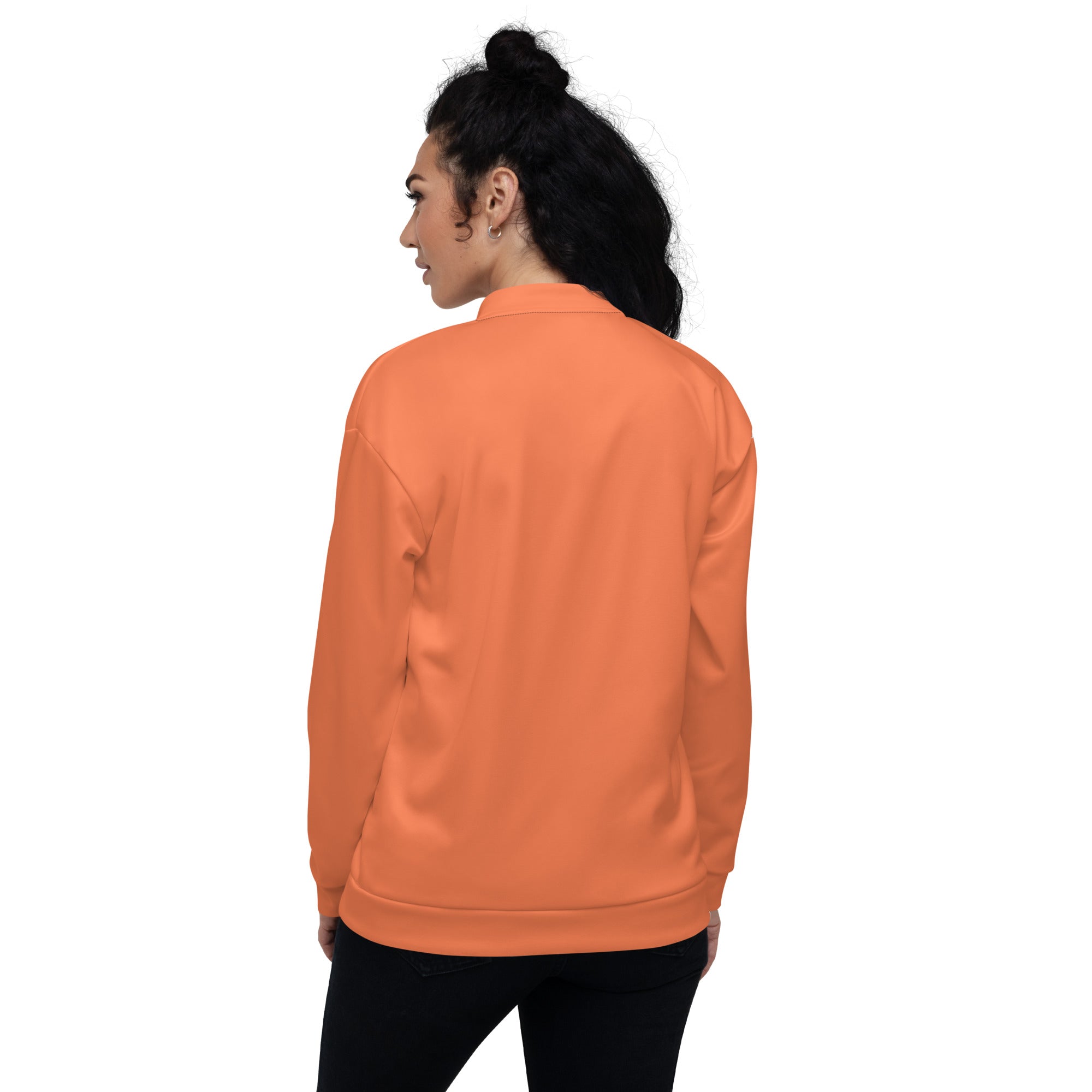 Women's Bomber Jacket in Coral Orange Red with zip-front closure and ribbed cuffs, showcasing its stylish design and functional pockets.