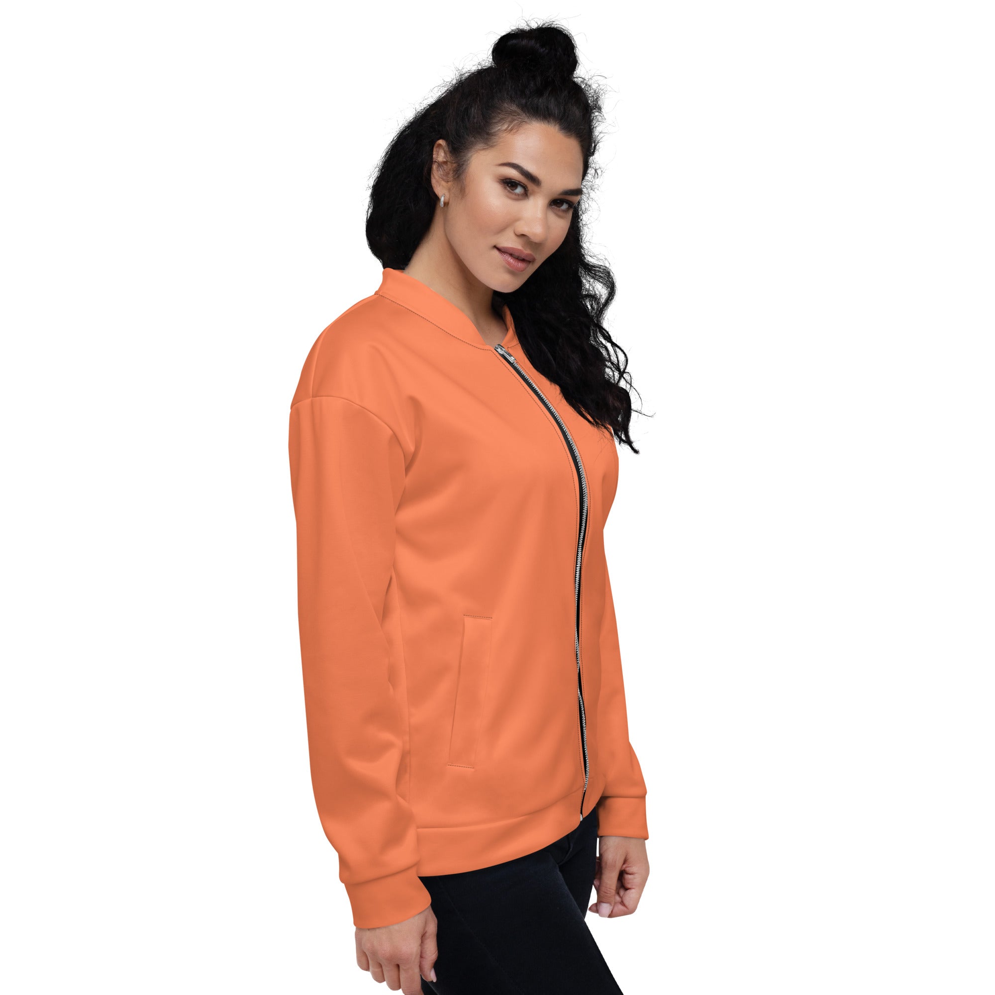 Women's Bomber Jacket in Coral Orange Red with zip-front closure and ribbed cuffs, showcasing its stylish design and functional pockets.