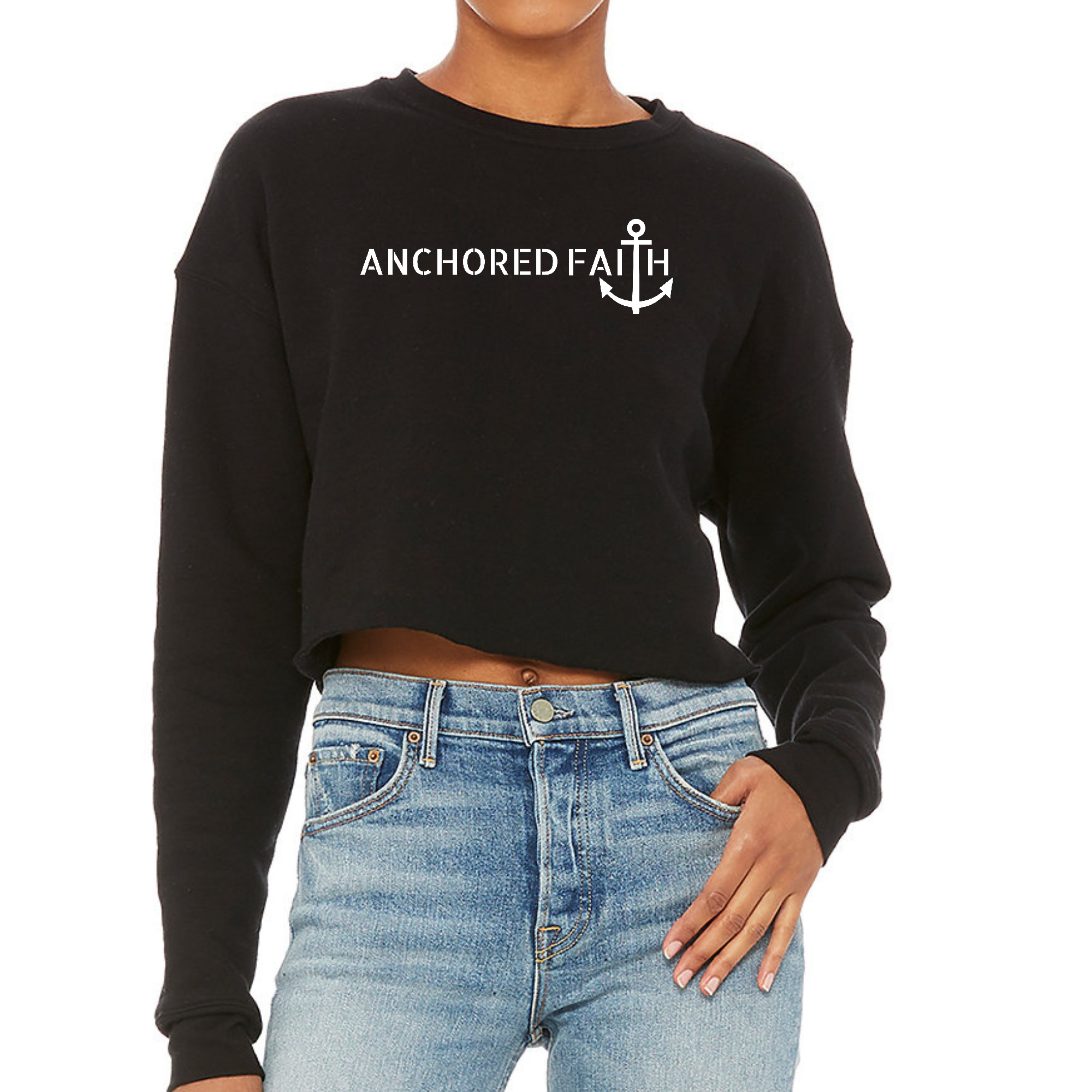 Women's cropped graphic sweatshirt featuring the Anchored Faith print, showcasing a stylish design and comfortable fit.