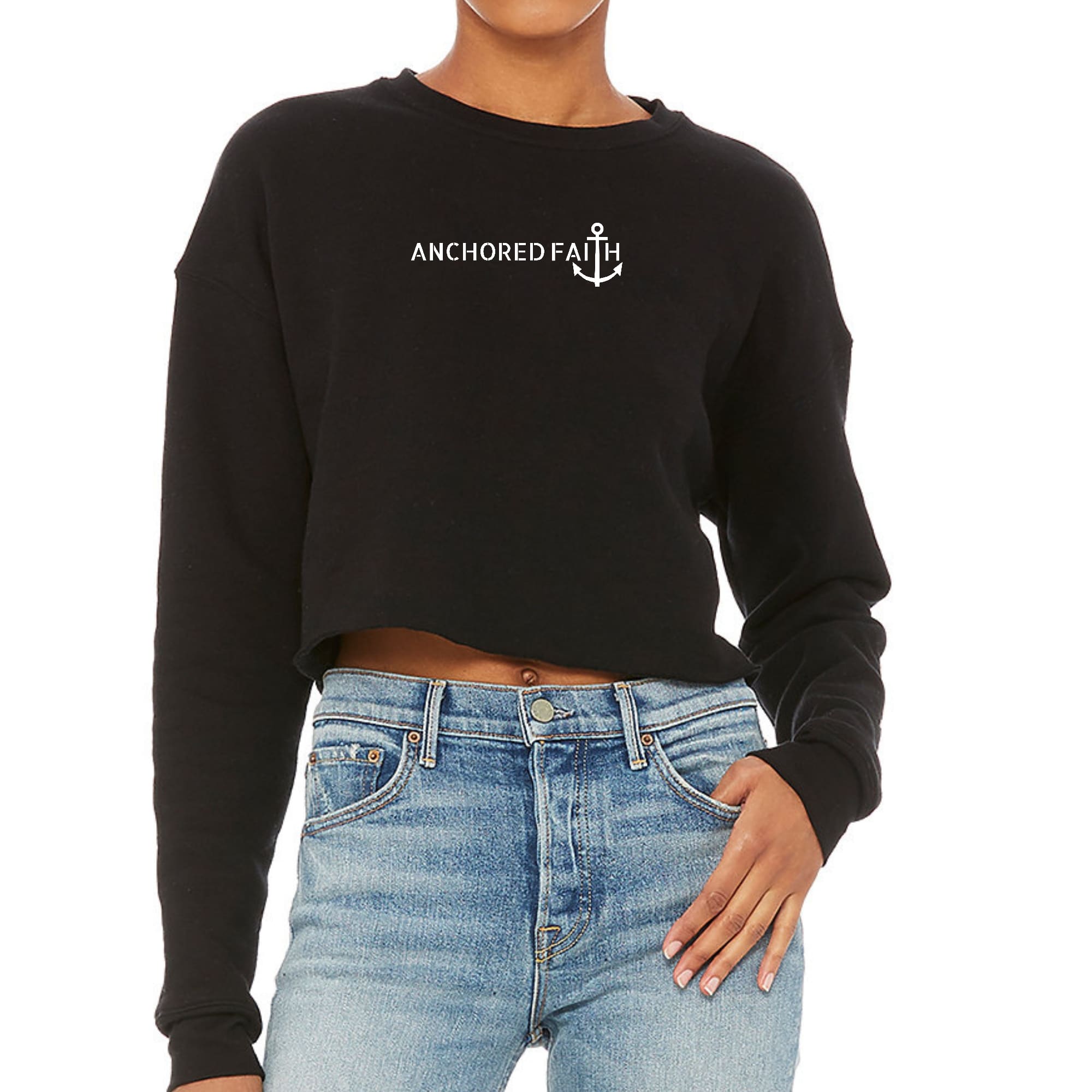 Women's cropped graphic sweatshirt featuring the Anchored Faith print, showcasing a stylish design and comfortable fit.