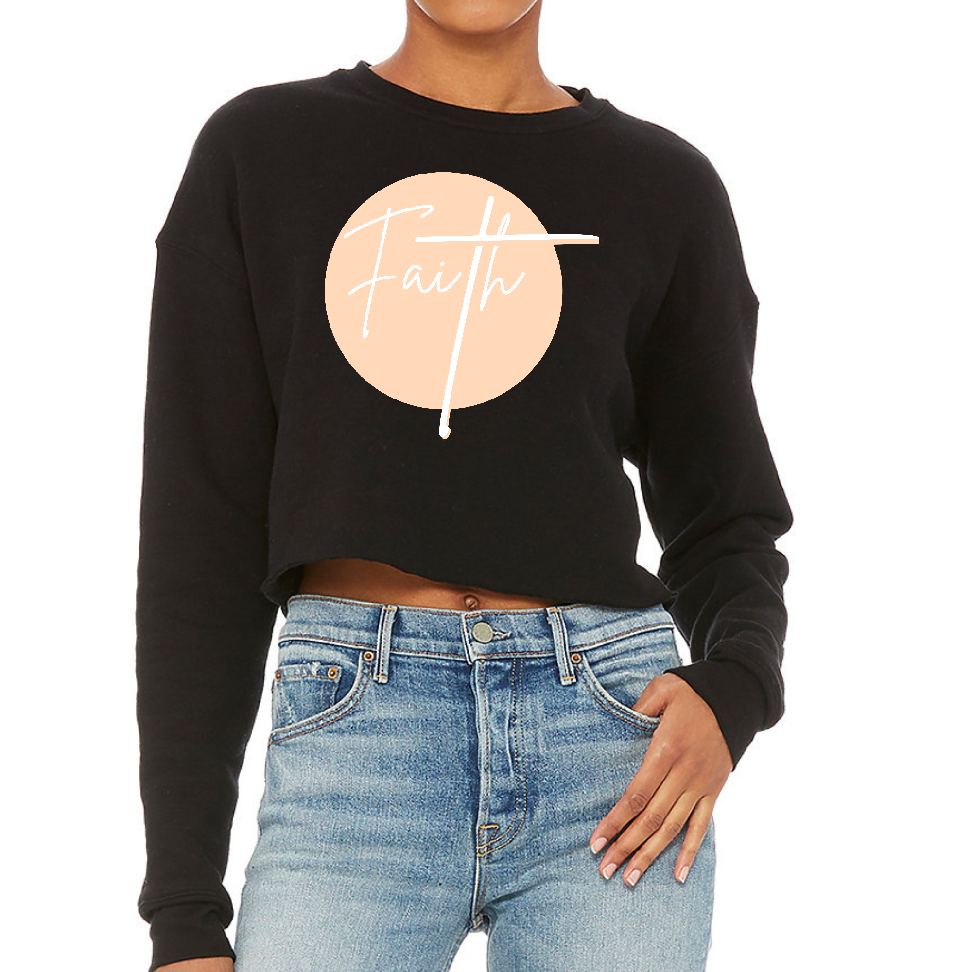 Women's cropped graphic sweatshirt in peach and white with Faith design, showcasing a relaxed fit and drop-shoulder seams.