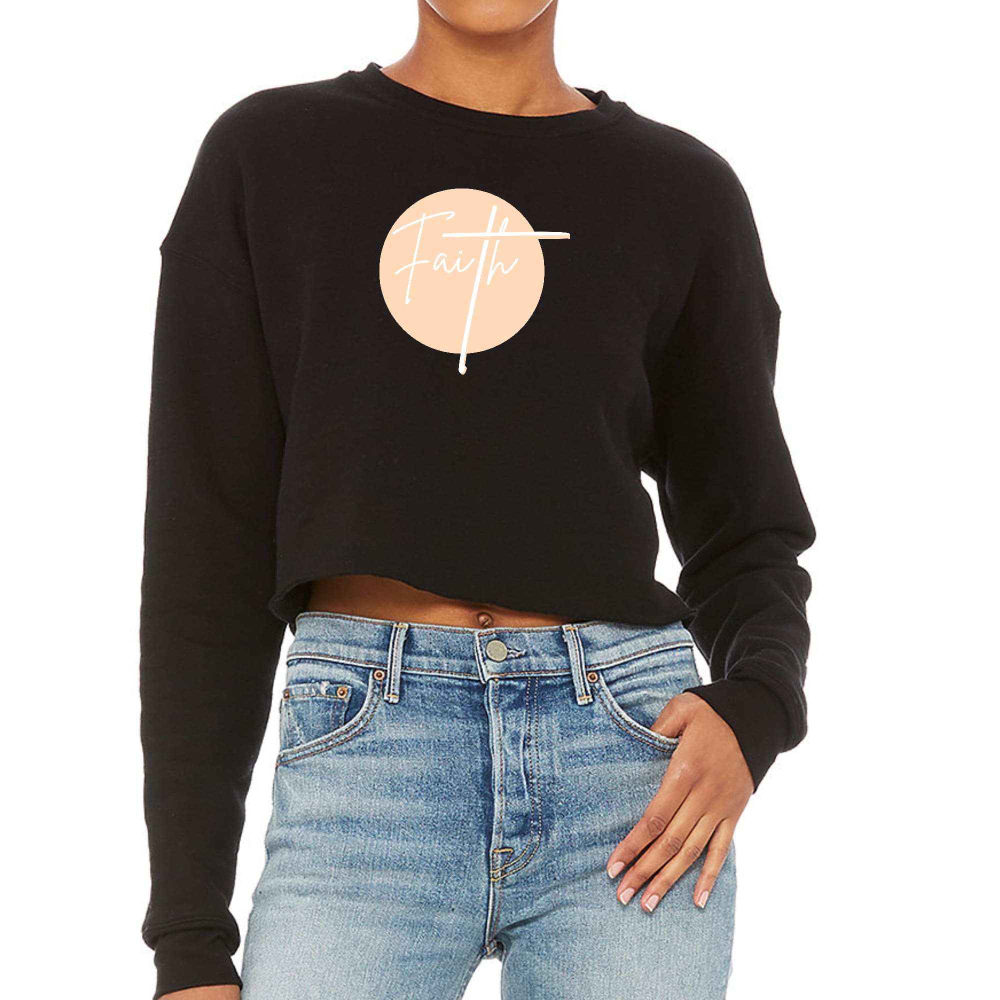 Women's cropped graphic sweatshirt in peach and white with Faith design, showcasing a relaxed fit and drop-shoulder seams.