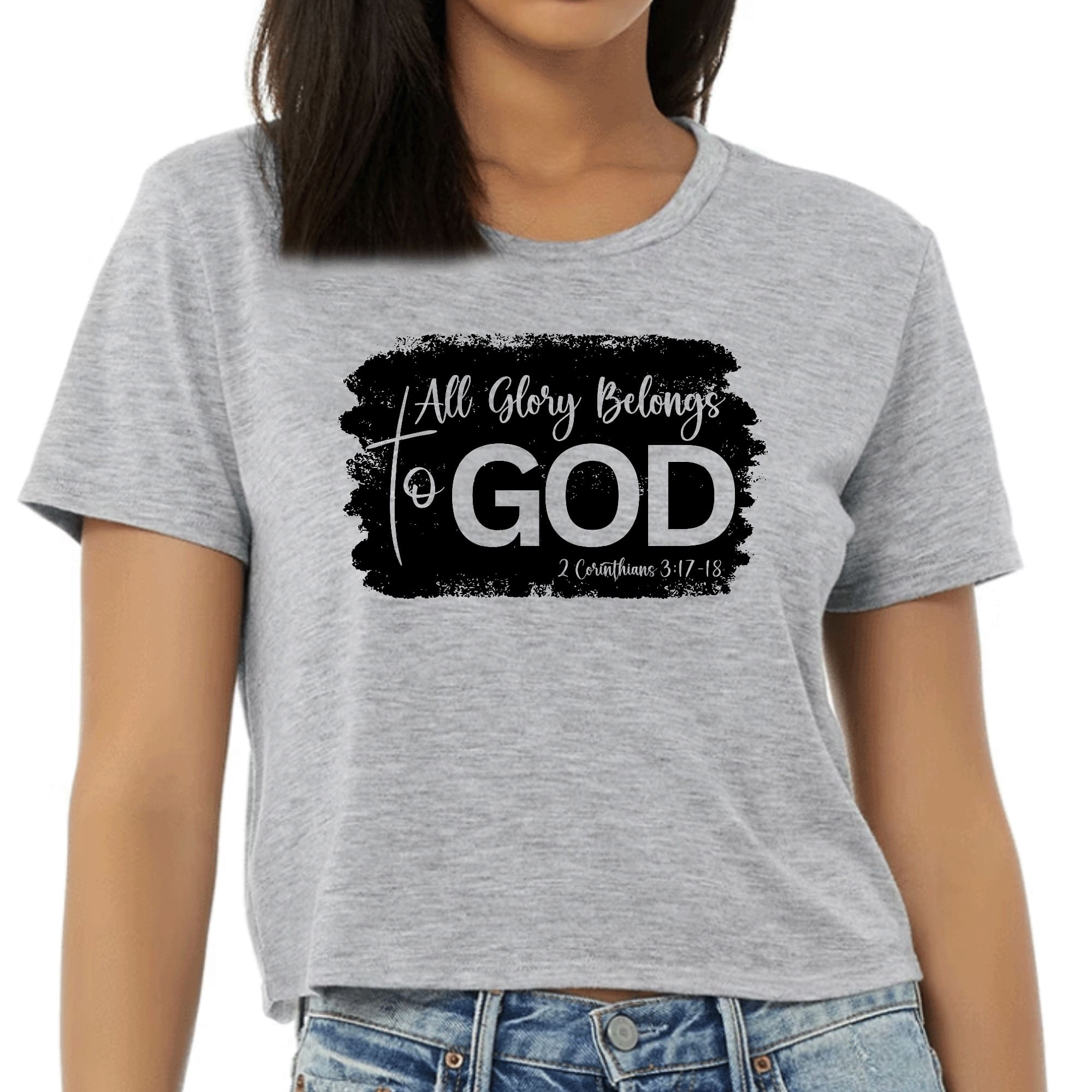 Womens cropped graphic t-shirt featuring 'All Glory Belongs to God' print in black, made from soft preshrunk cotton.