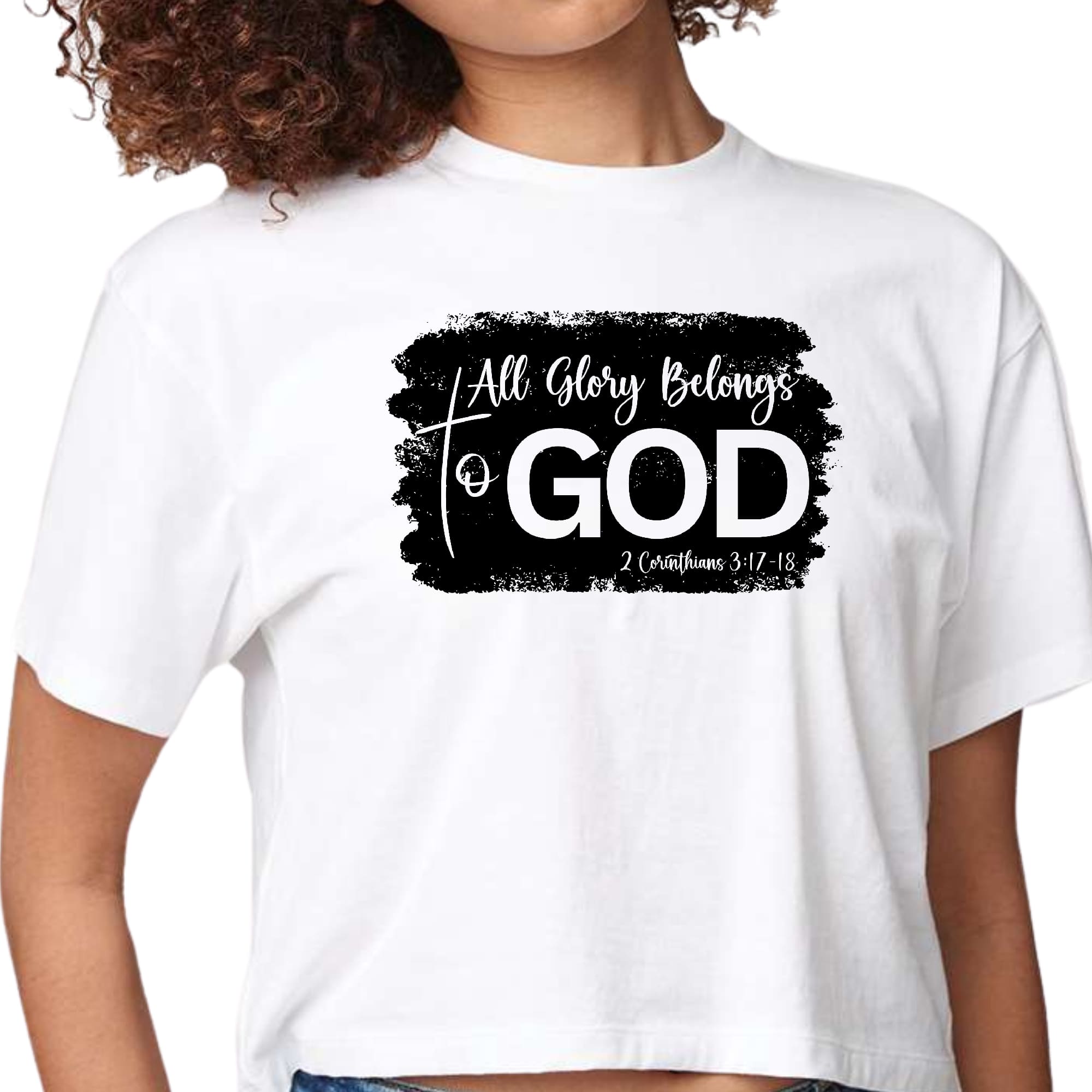 Womens cropped graphic t-shirt featuring 'All Glory Belongs to God' print in black, made from soft preshrunk cotton.