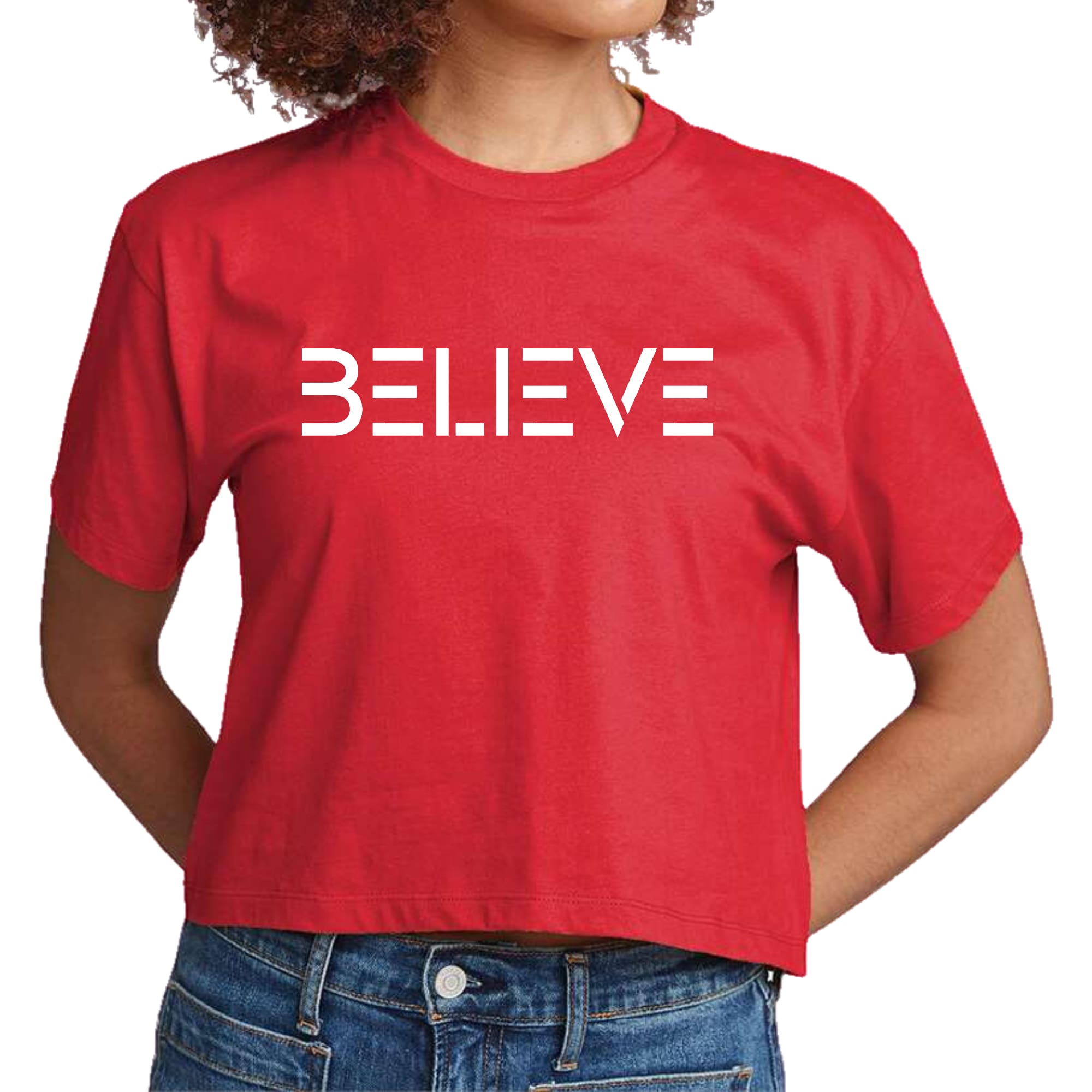 Women's cropped graphic t-shirt in white featuring an inspirational 'Believe' print, made from soft preshrunk cotton.