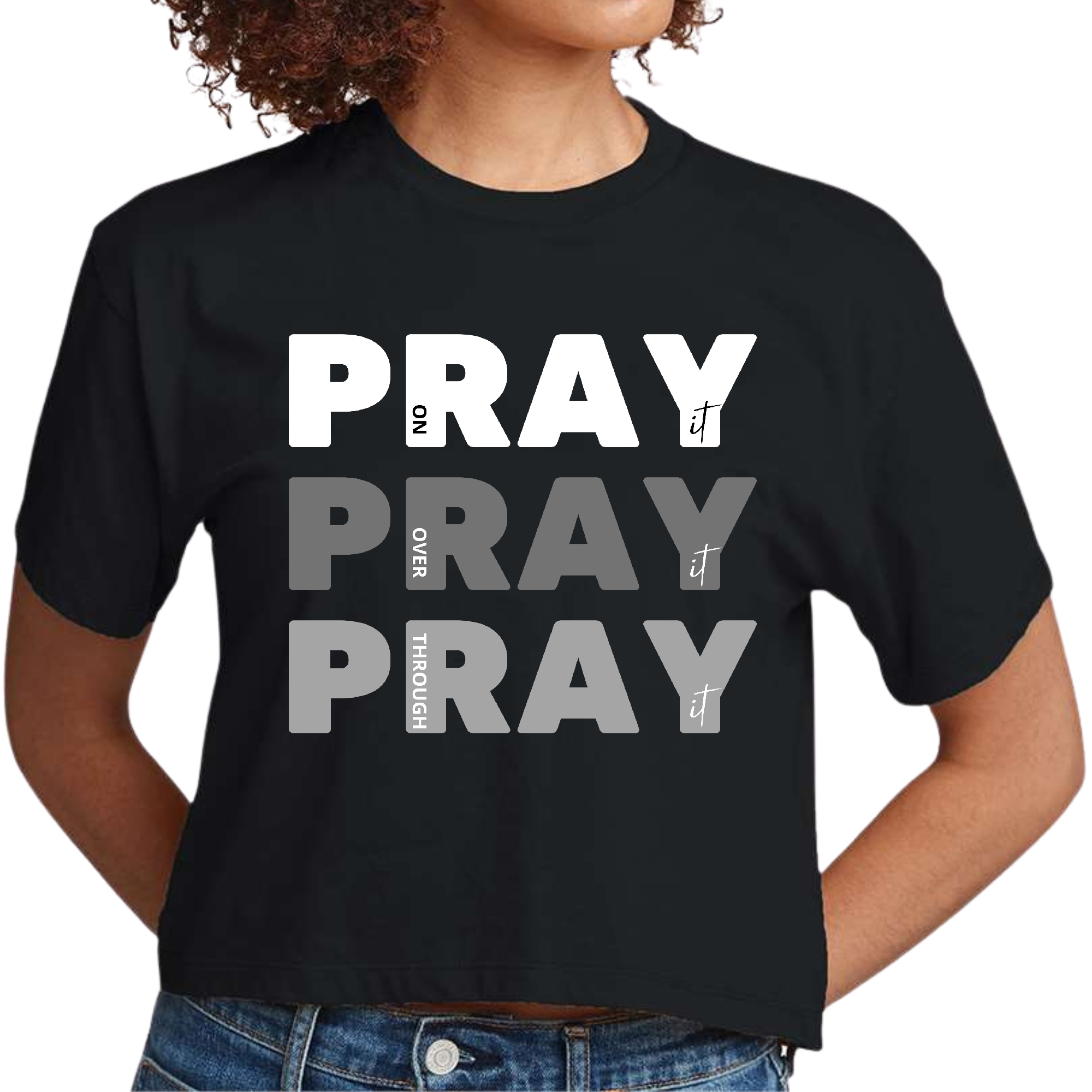 Women's cropped graphic t-shirt with 'Pray On It Over It Through It' design, showcasing a comfortable fit and soft fabric.