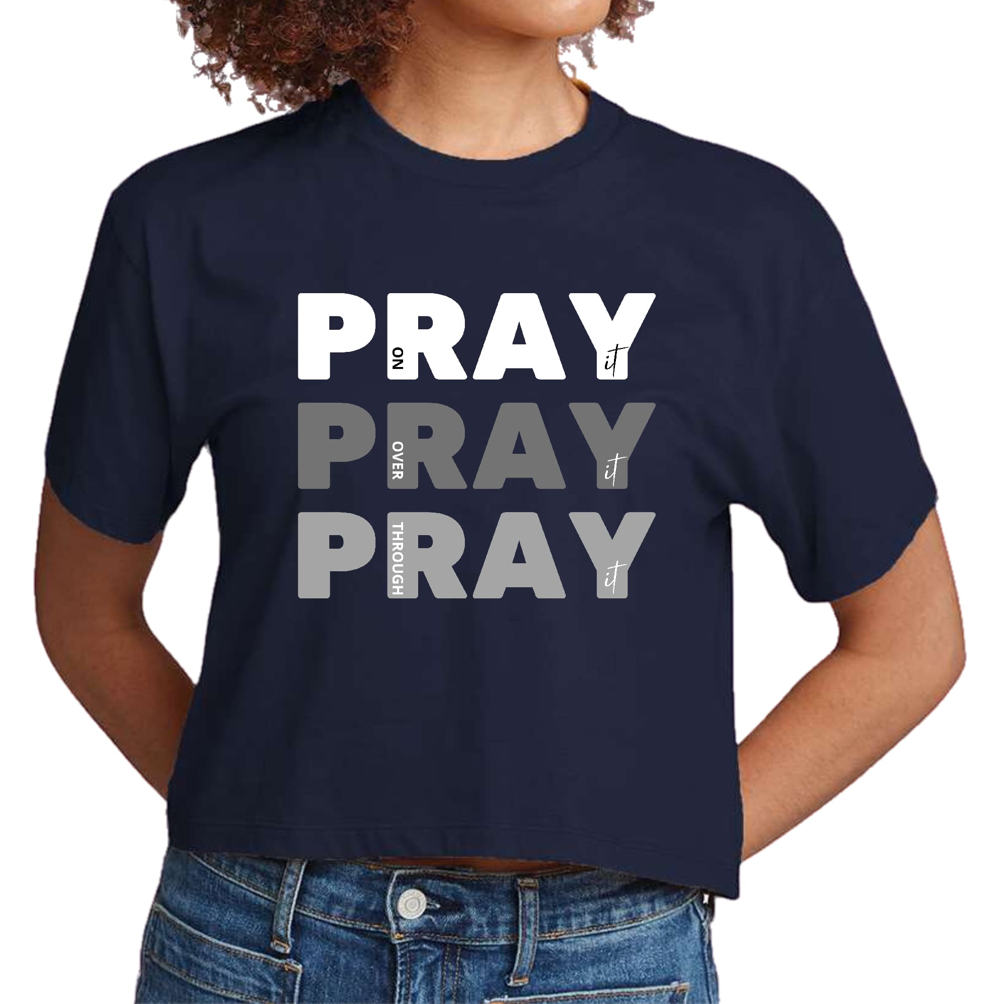 Women's cropped graphic t-shirt with 'Pray On It Over It Through It' design, showcasing a comfortable fit and soft fabric.