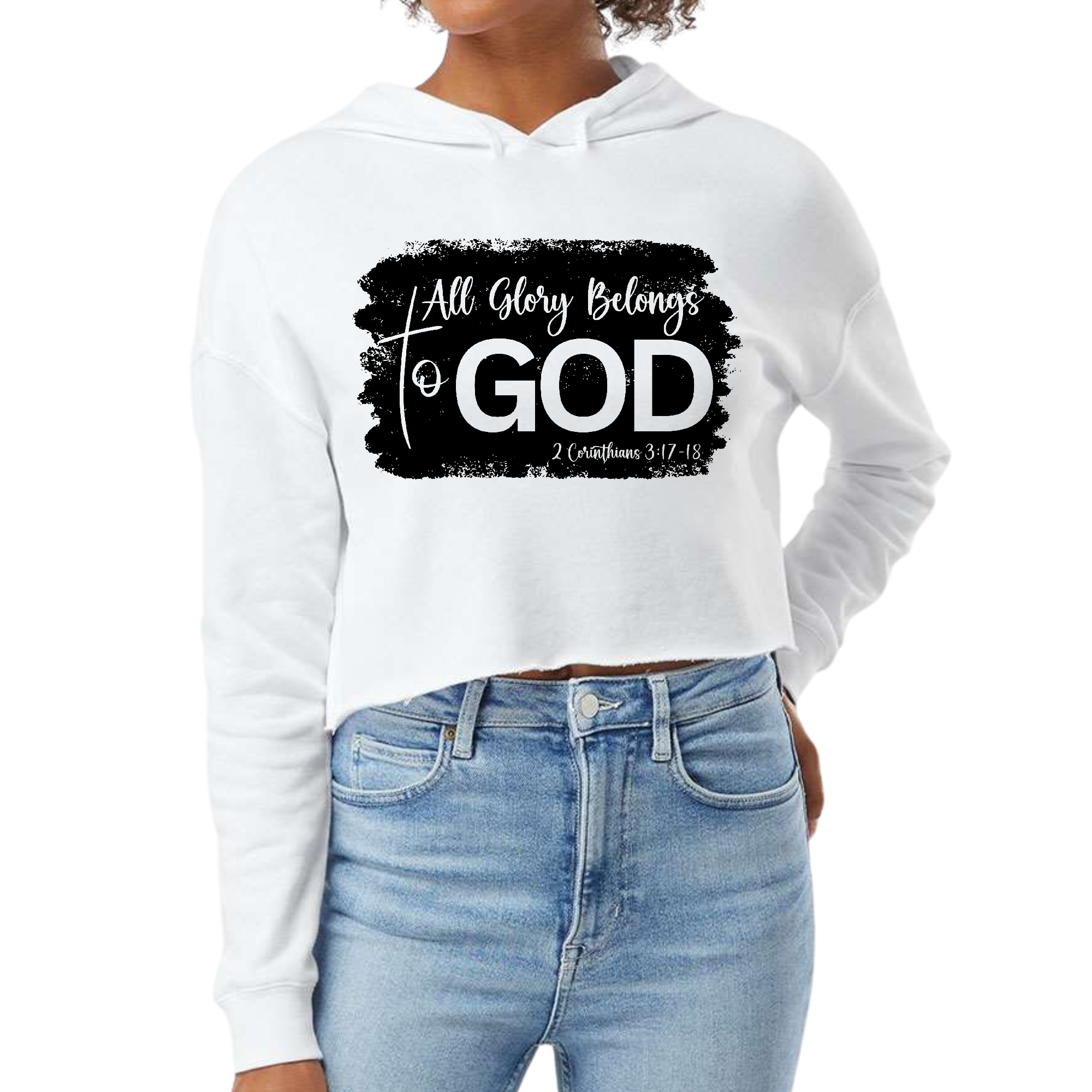 Women's cropped hoodie in black featuring 'All Glory Belongs to God' print, showcasing a stylish design with a double fabric hood and raw edge hem.