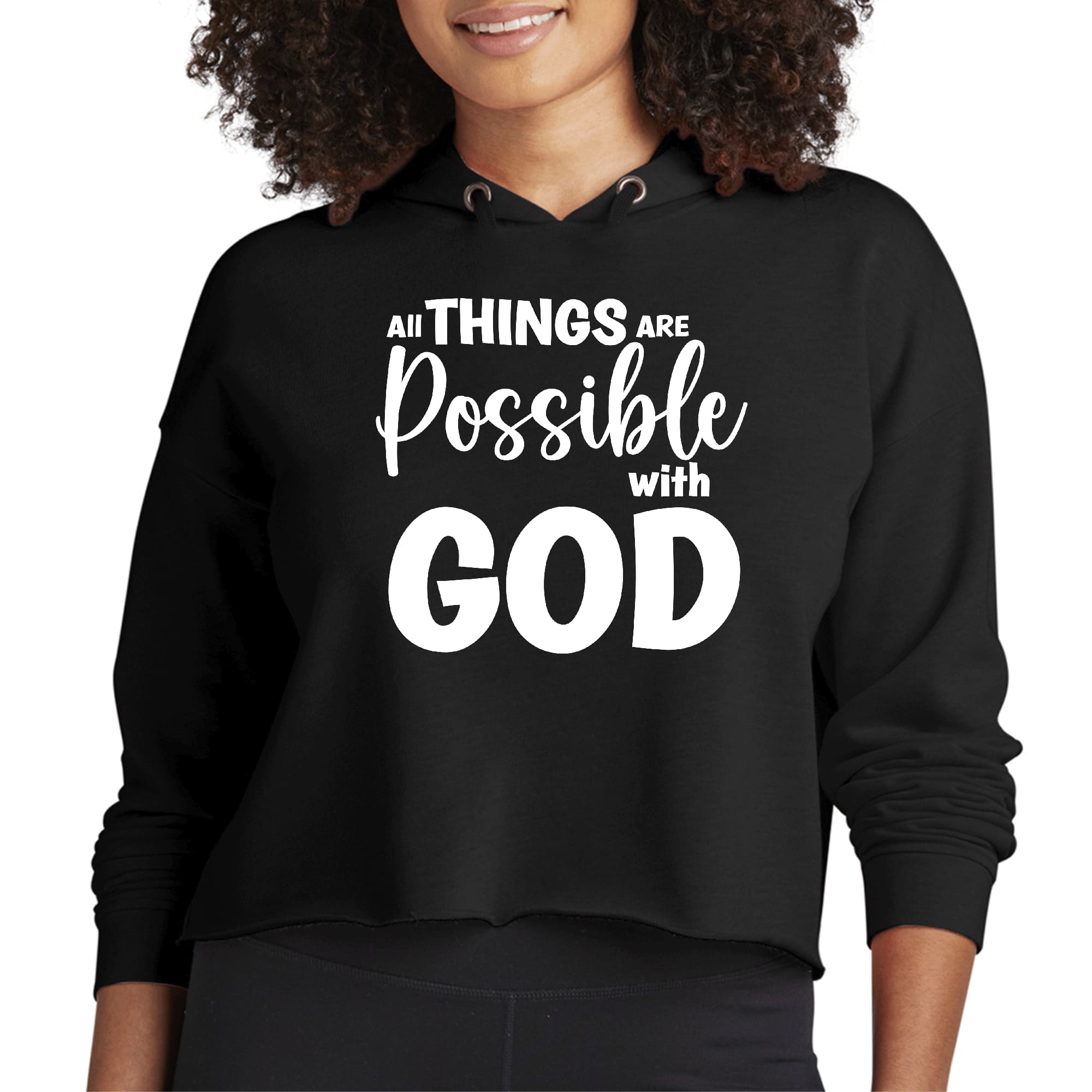 Women's cropped hoodie featuring the phrase 'All Things are Possible with God', showcasing a stylish design with a double fabric hood and raw edge hem.