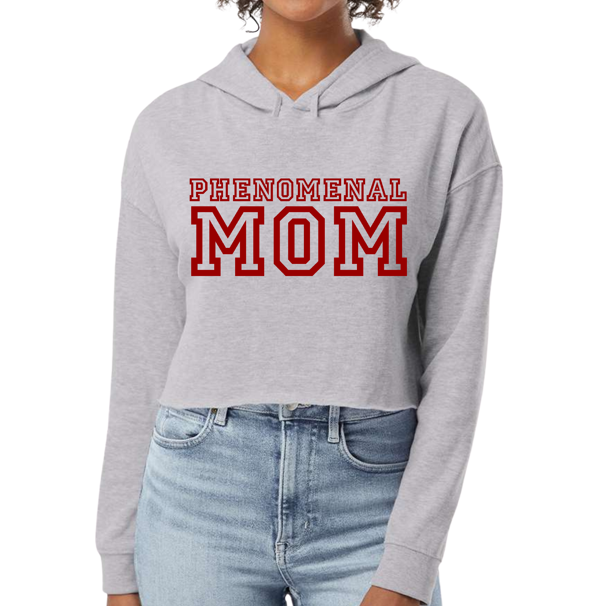 A stylish women's cropped hoodie featuring a red print that says 'Phenomenal Mom', showcasing a relaxed fit and raw edge cut hem.