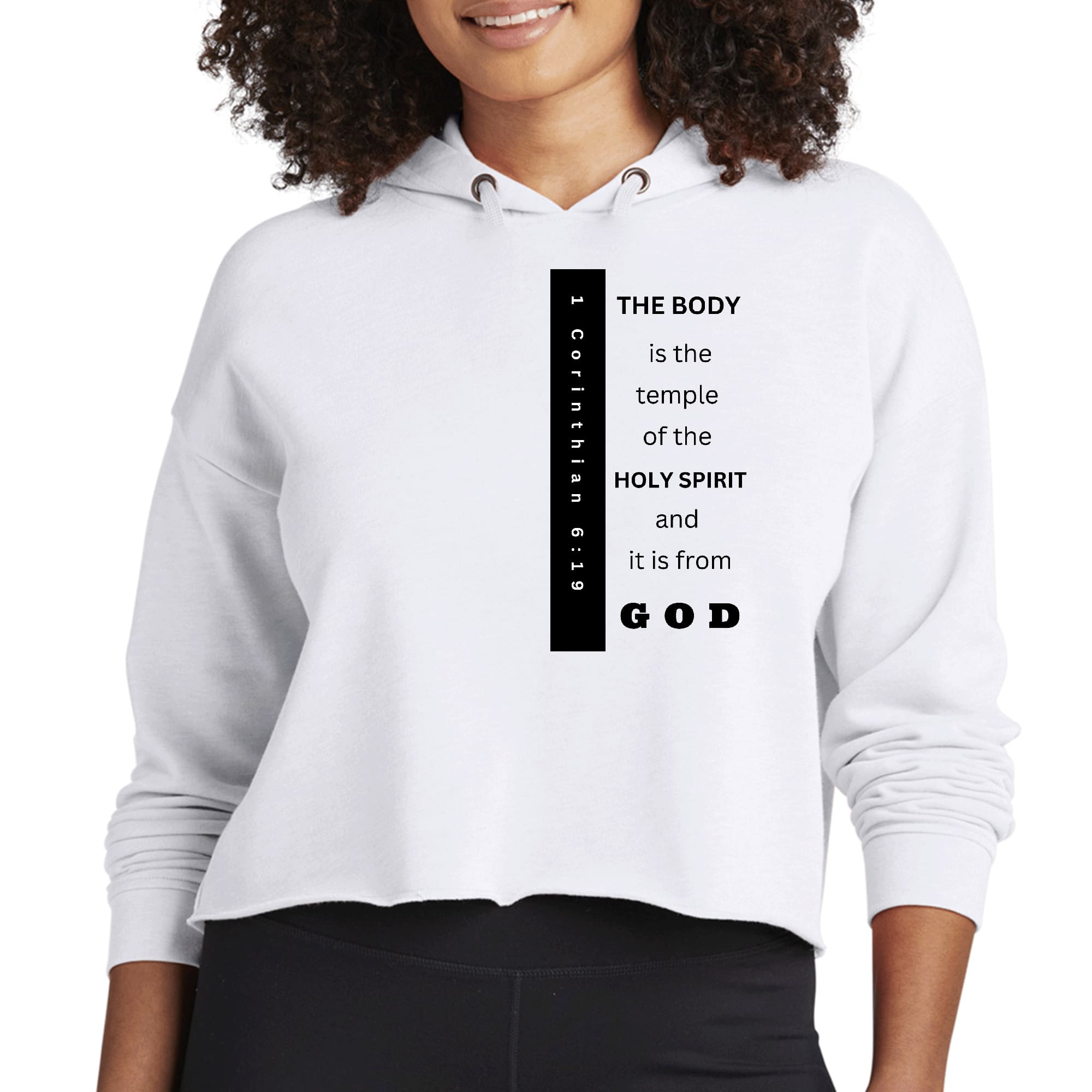 Women's cropped hoodie in black featuring 'The Body is the Temple' scripture print, showcasing a relaxed fit and stylish design.