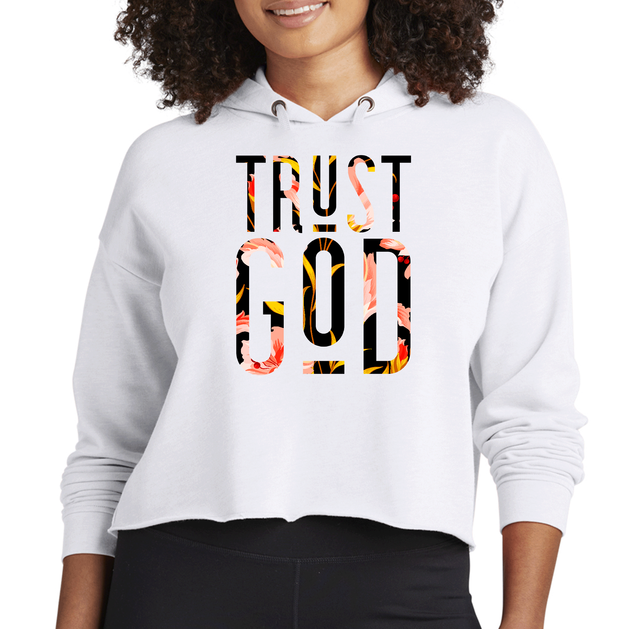 Womens Cropped Hoodie featuring a floral print with 'Trust God' text, showcasing a trendy cropped design and comfortable fit.