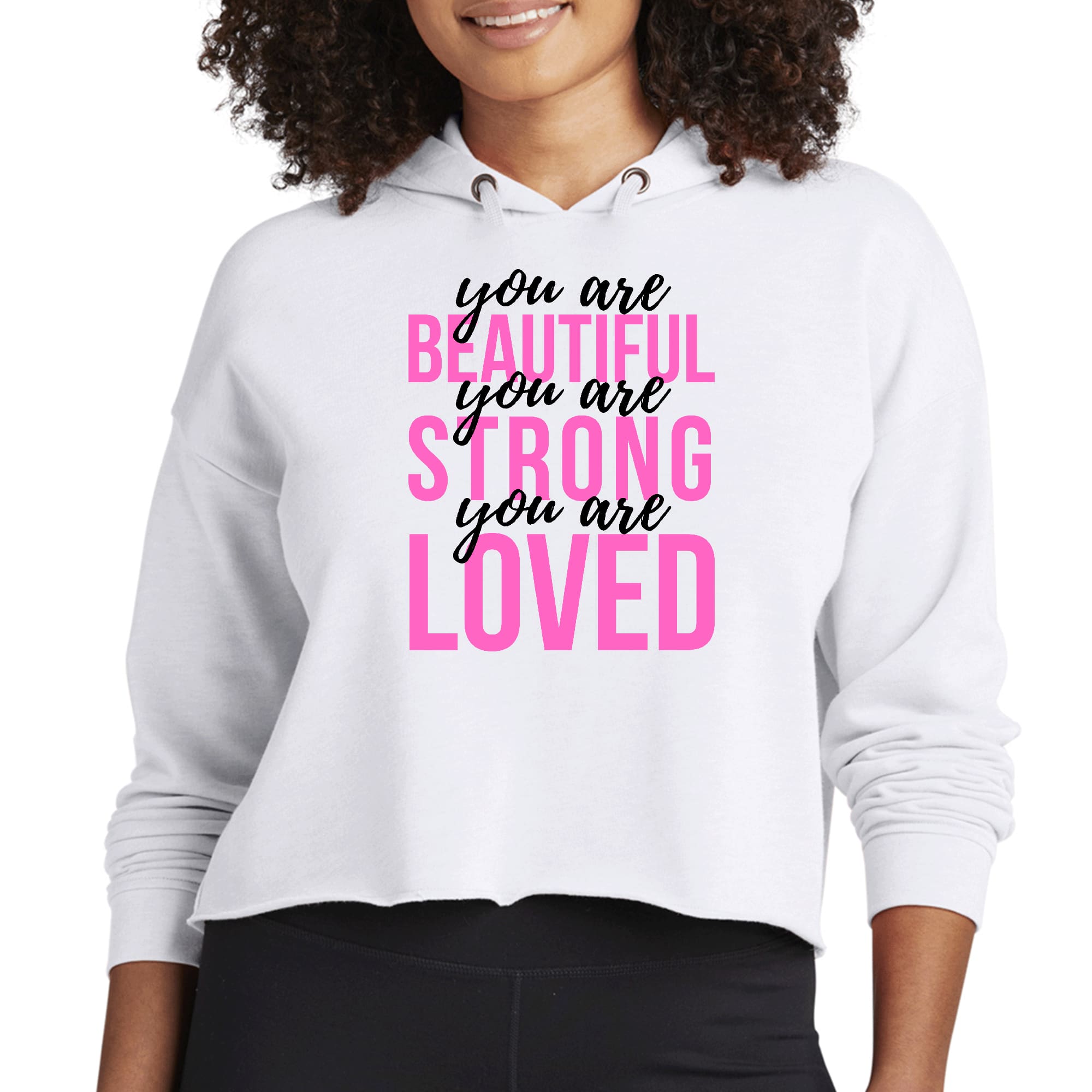 Women's Cropped Hoodie in pink with 'You Are Beautiful Strong Loved' print, featuring a relaxed fit and double fabric hood.