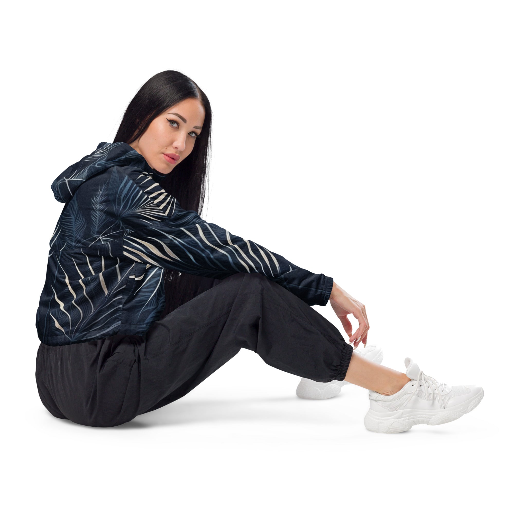 Women's Cropped Windbreaker Jacket in blue and white with palm leaves design, featuring a hood, adjustable drawstrings, and side-slit pockets.