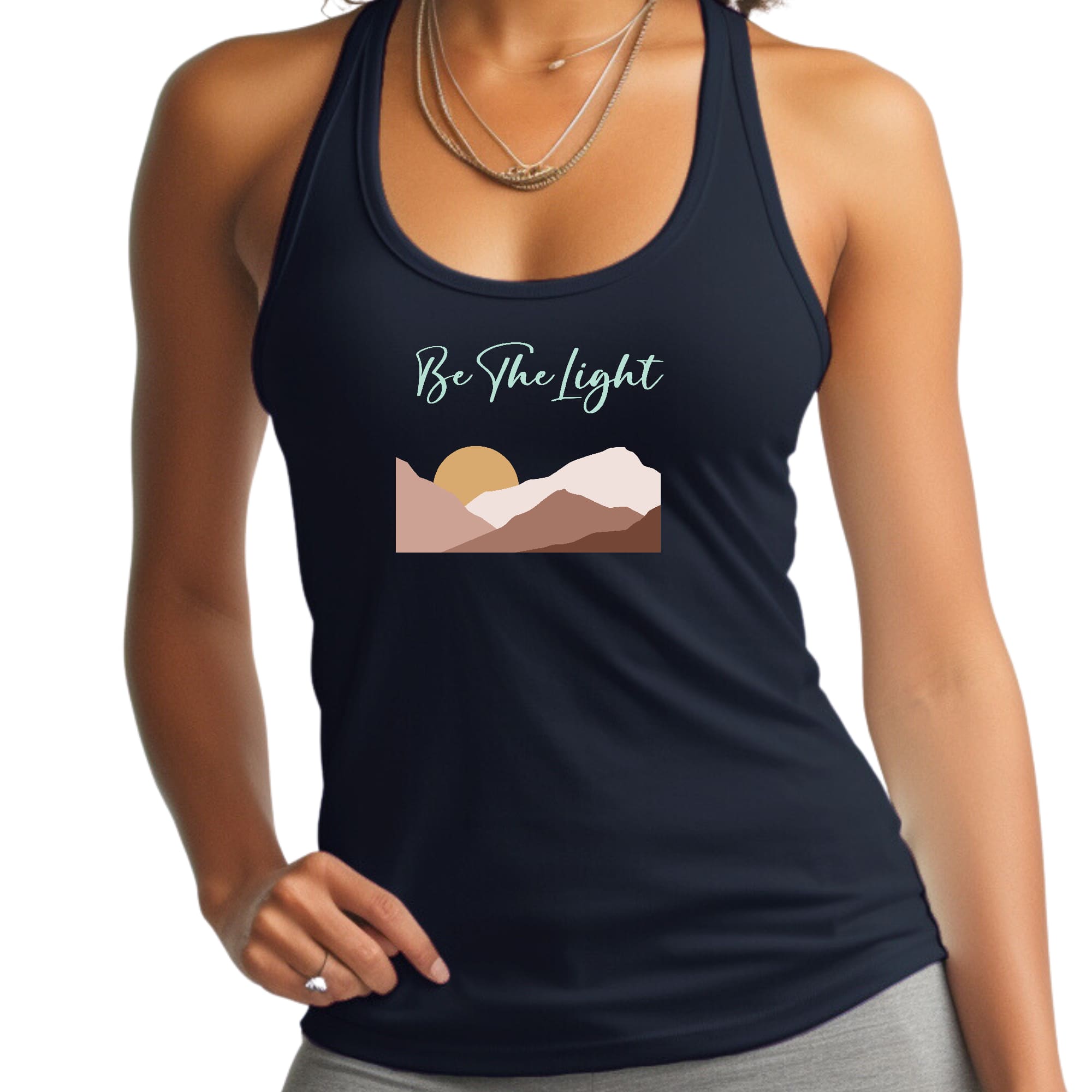 A stylish women's fitness tank top featuring the inspirational phrase 'Say It Soul, Be The Light' in a boho aesthetic design, made from soft preshrunk cotton.