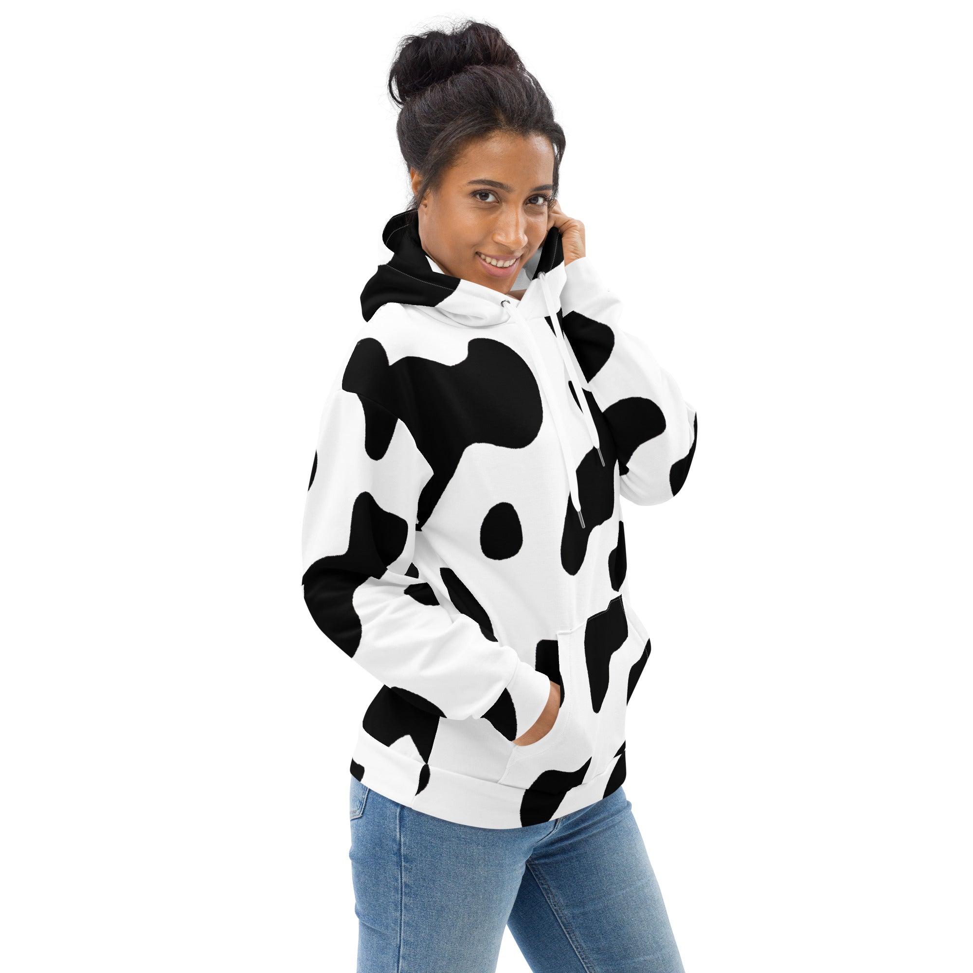 Womens Graphic Hoodie featuring a stylish black and white cow print design, showcasing a comfortable fit with a double-lined hood and front pouch pocket.