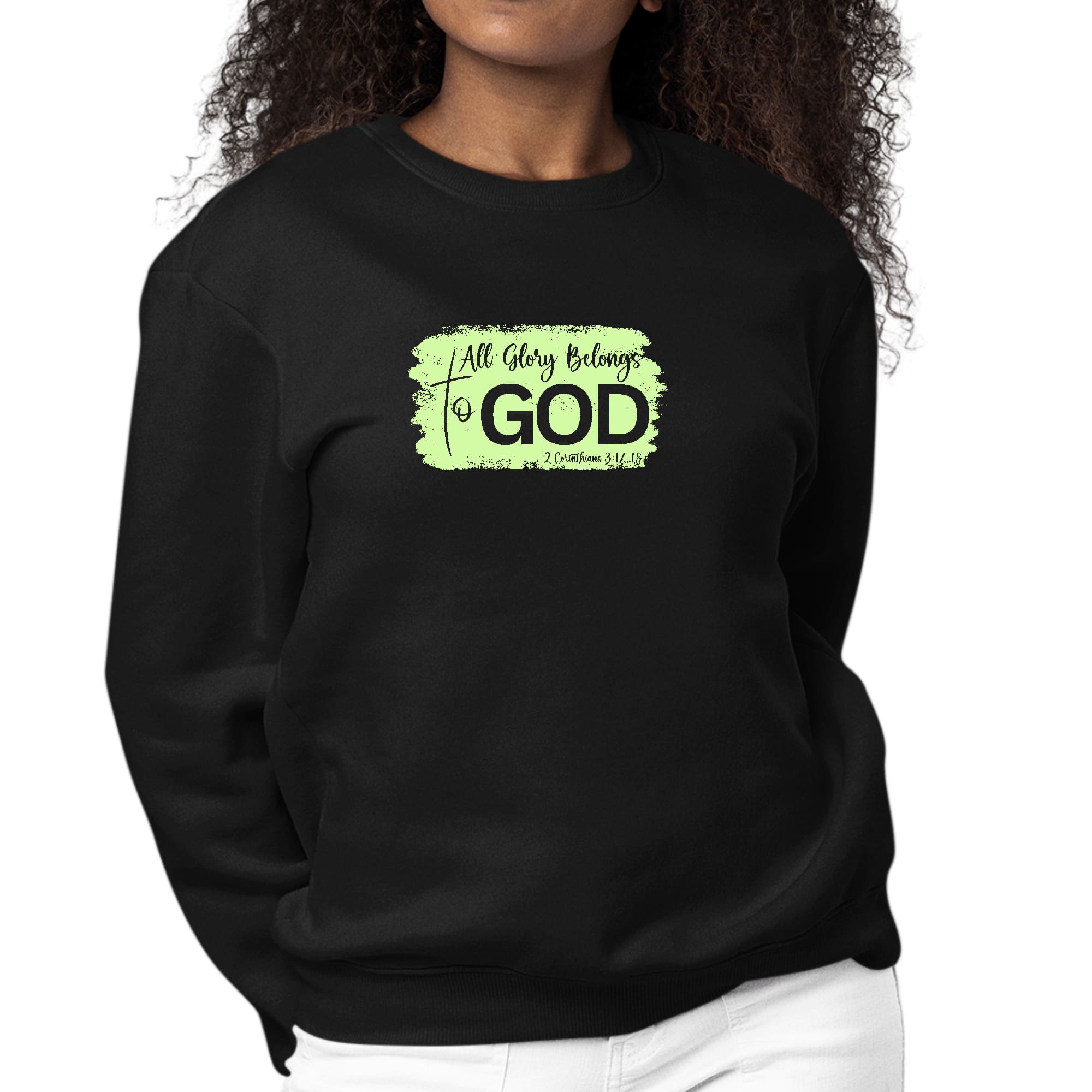 Women's long sleeve graphic sweatshirt in neon with 'All Glory Belongs to God' illustration, showcasing comfort and style.