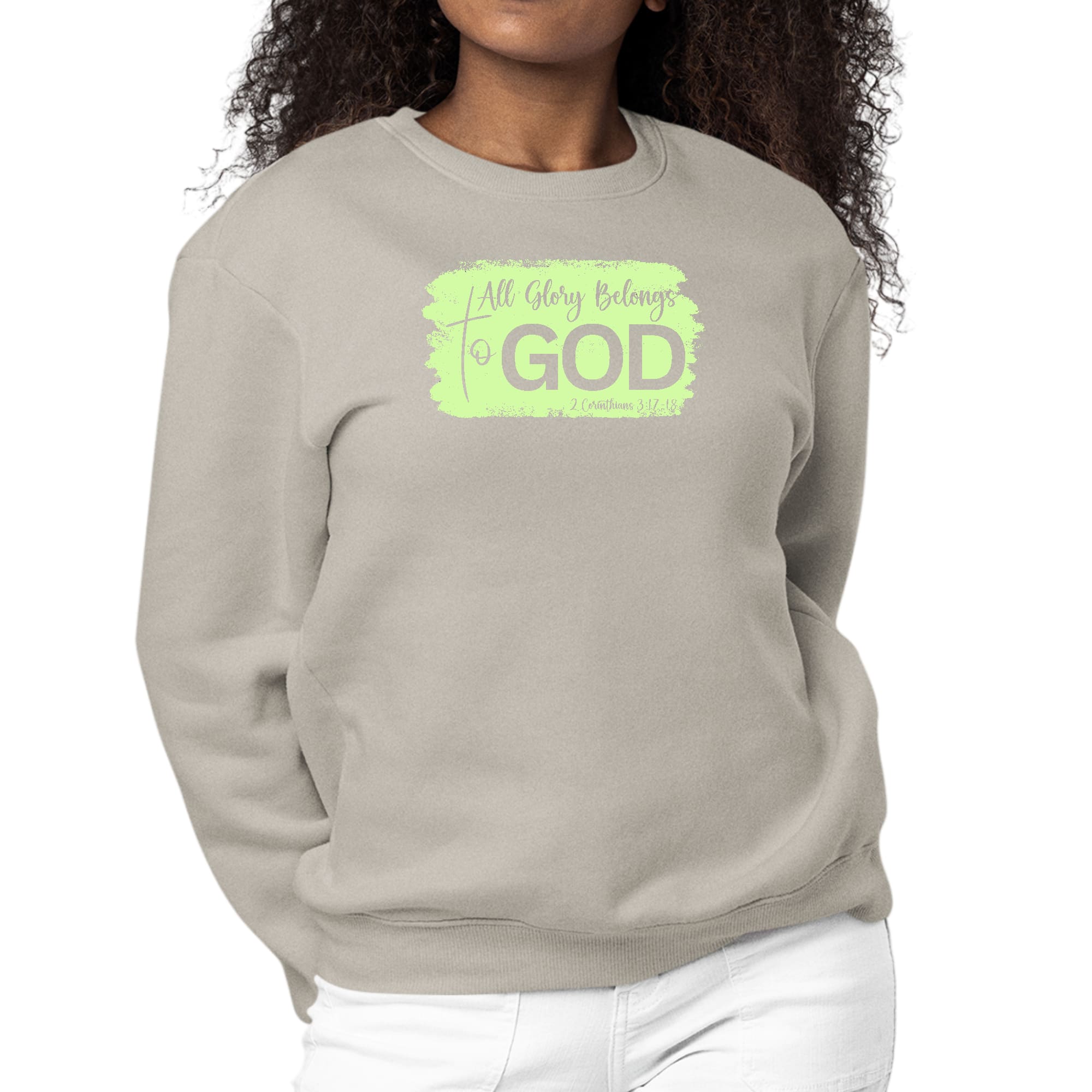 Women's long sleeve graphic sweatshirt in neon with 'All Glory Belongs to God' illustration, showcasing comfort and style.