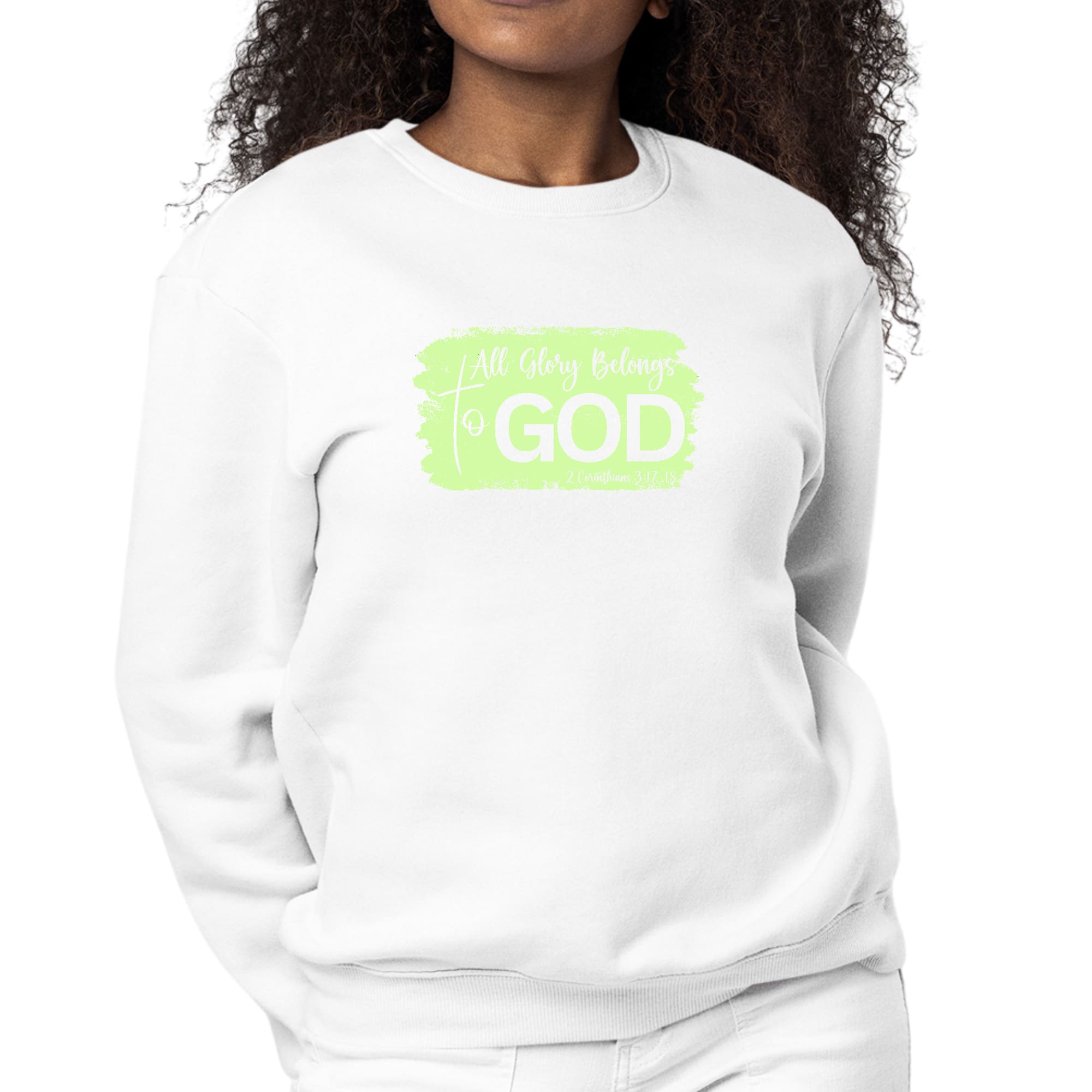 Women's long sleeve graphic sweatshirt in neon with 'All Glory Belongs to God' illustration, showcasing comfort and style.