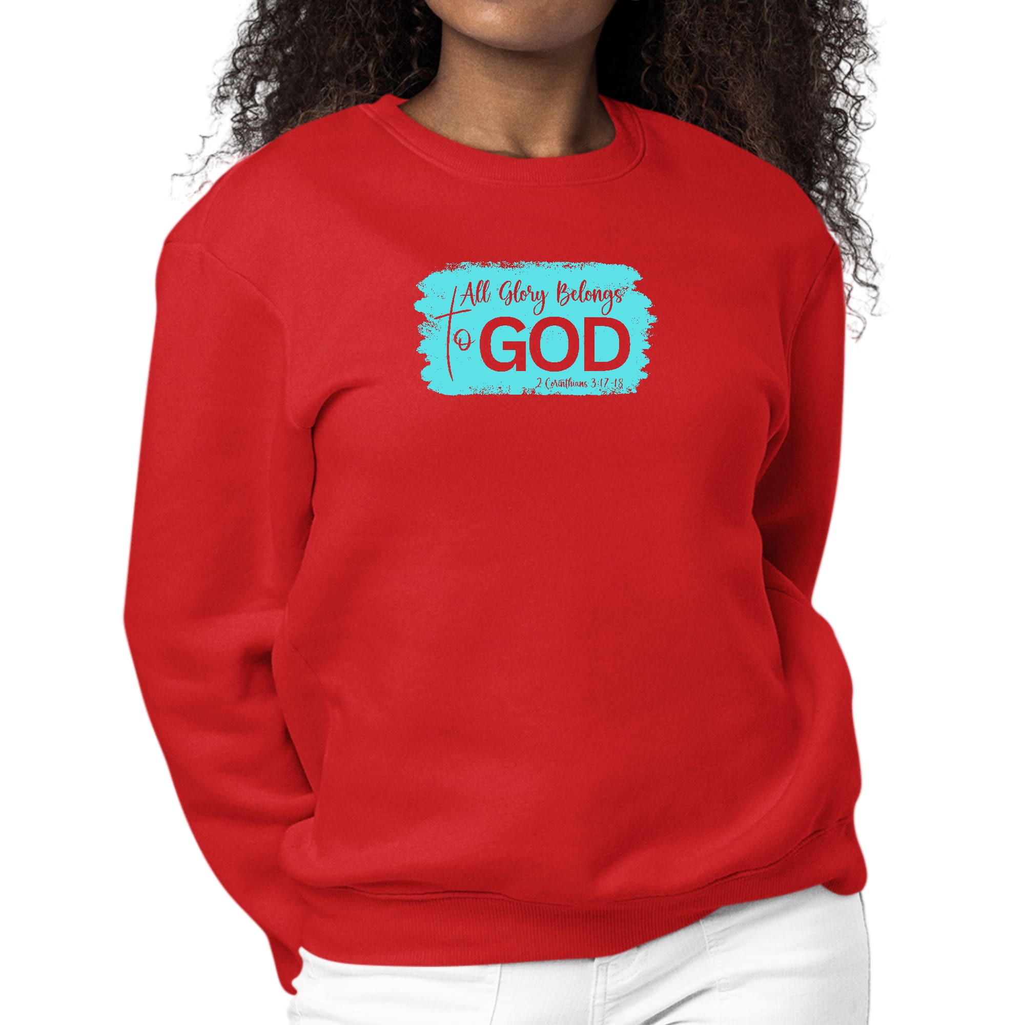 Women's long sleeve crewneck sweatshirt with 'All Glory Belongs to God' graphic in cyan, showcasing comfort and style.