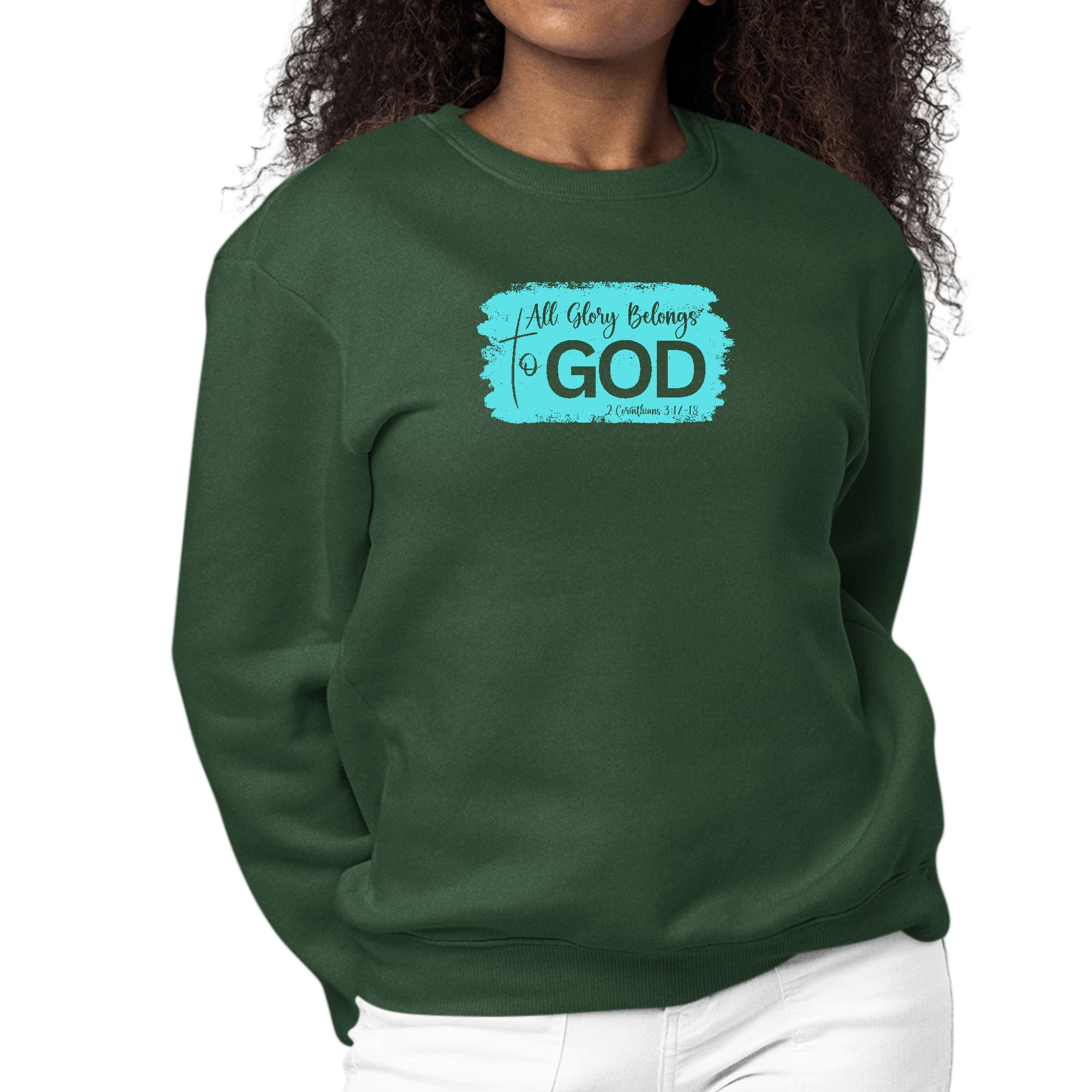 Women's long sleeve crewneck sweatshirt with 'All Glory Belongs to God' graphic in cyan, showcasing comfort and style.