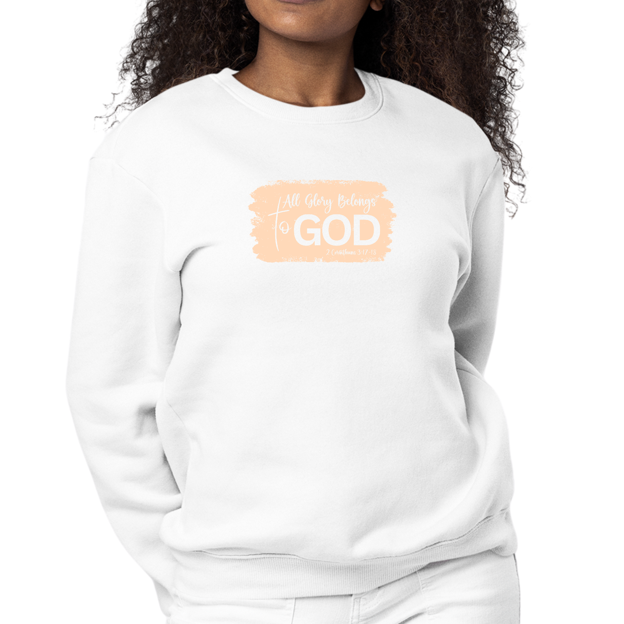 Womens Graphic Sweatshirt in peach color with 'All Glory Belongs to God' illustration, showcasing a cozy and stylish design.