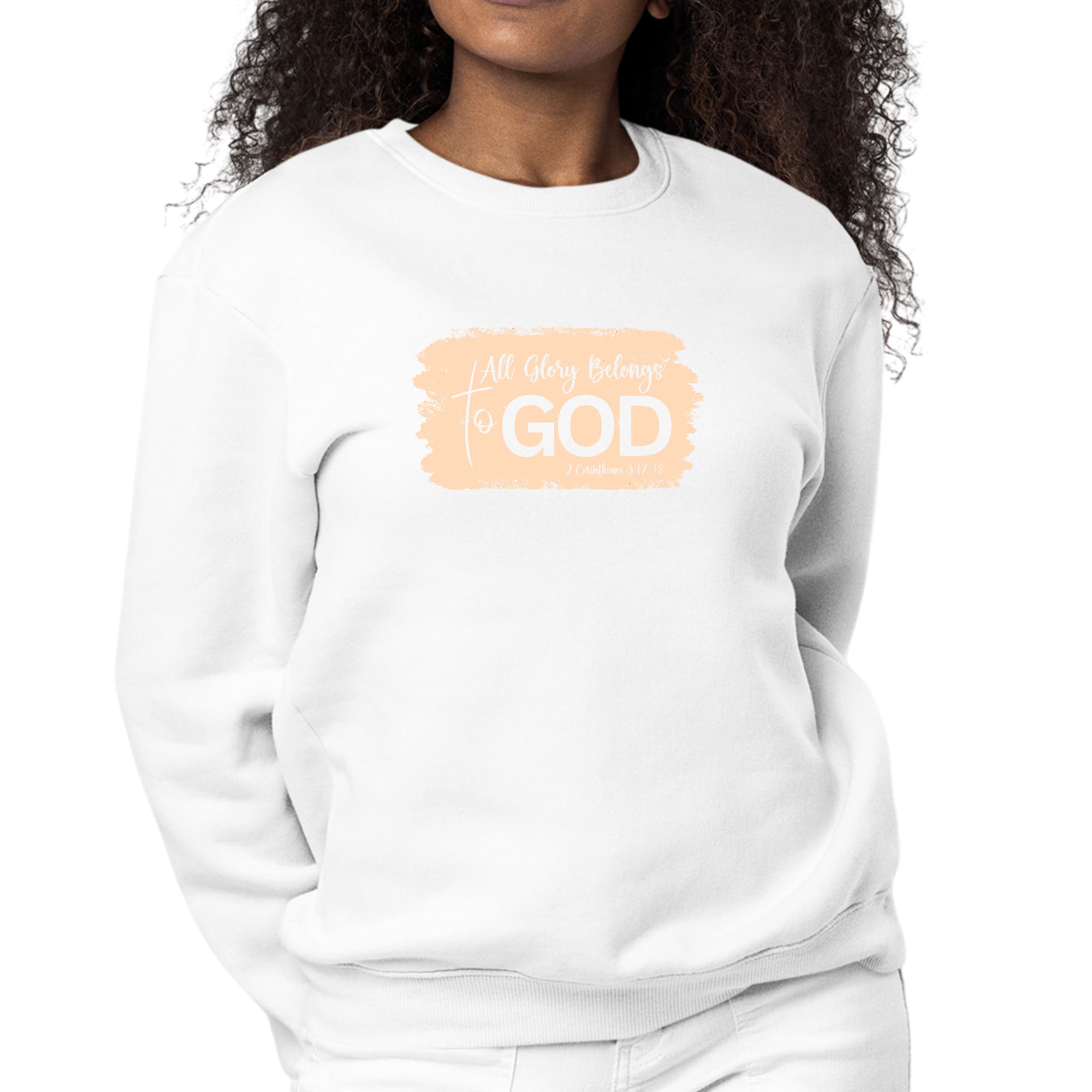 Womens Graphic Sweatshirt in peach color with 'All Glory Belongs to God' illustration, showcasing a cozy and stylish design.