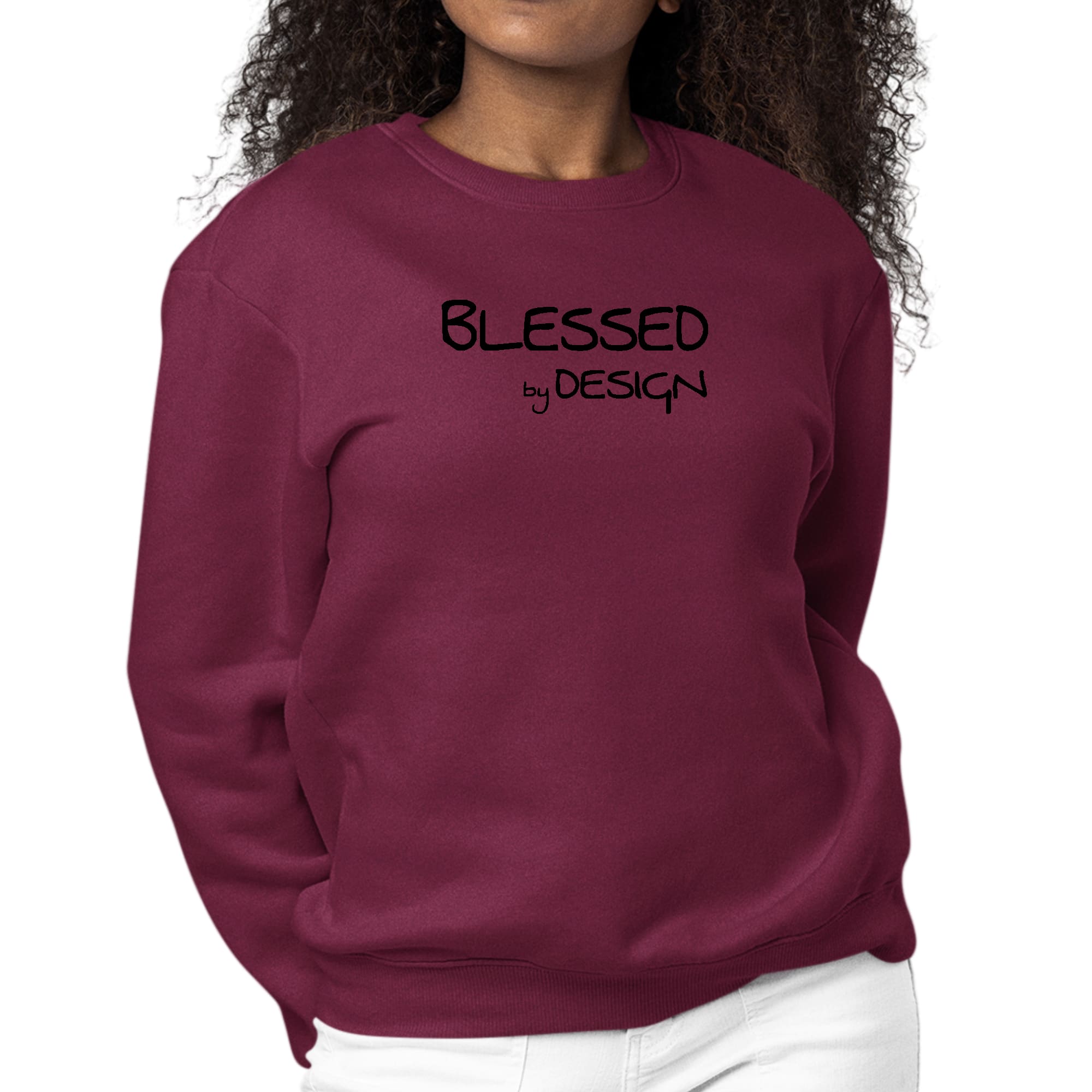 Women's black graphic sweatshirt featuring the inspirational phrase 'Blessed by Design' on the front, designed for comfort and style.