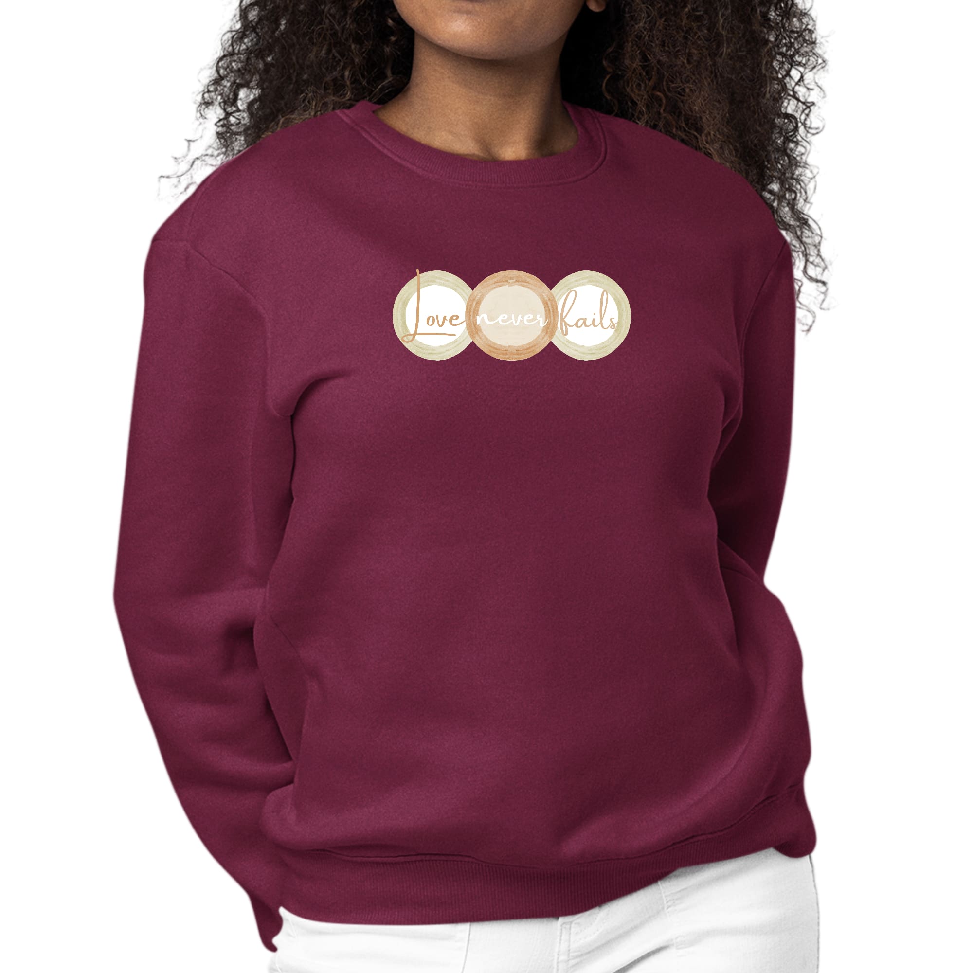 Womens Graphic Sweatshirt in pastel brown, beige, and green with 'Love Never Fails' design and tri-circular shapes.