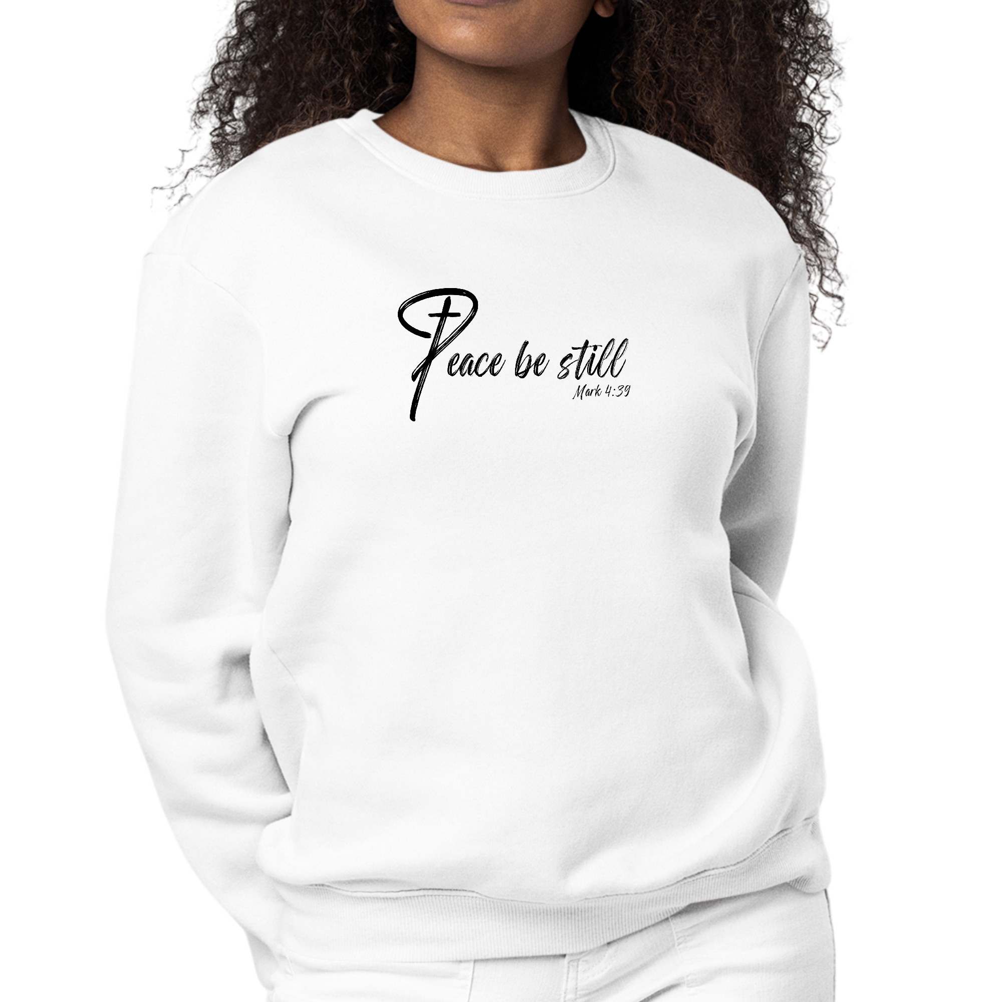 Womens Graphic Sweatshirt featuring 'Peace Be Still' design, showcasing cozy fleece material and classic crewneck style.