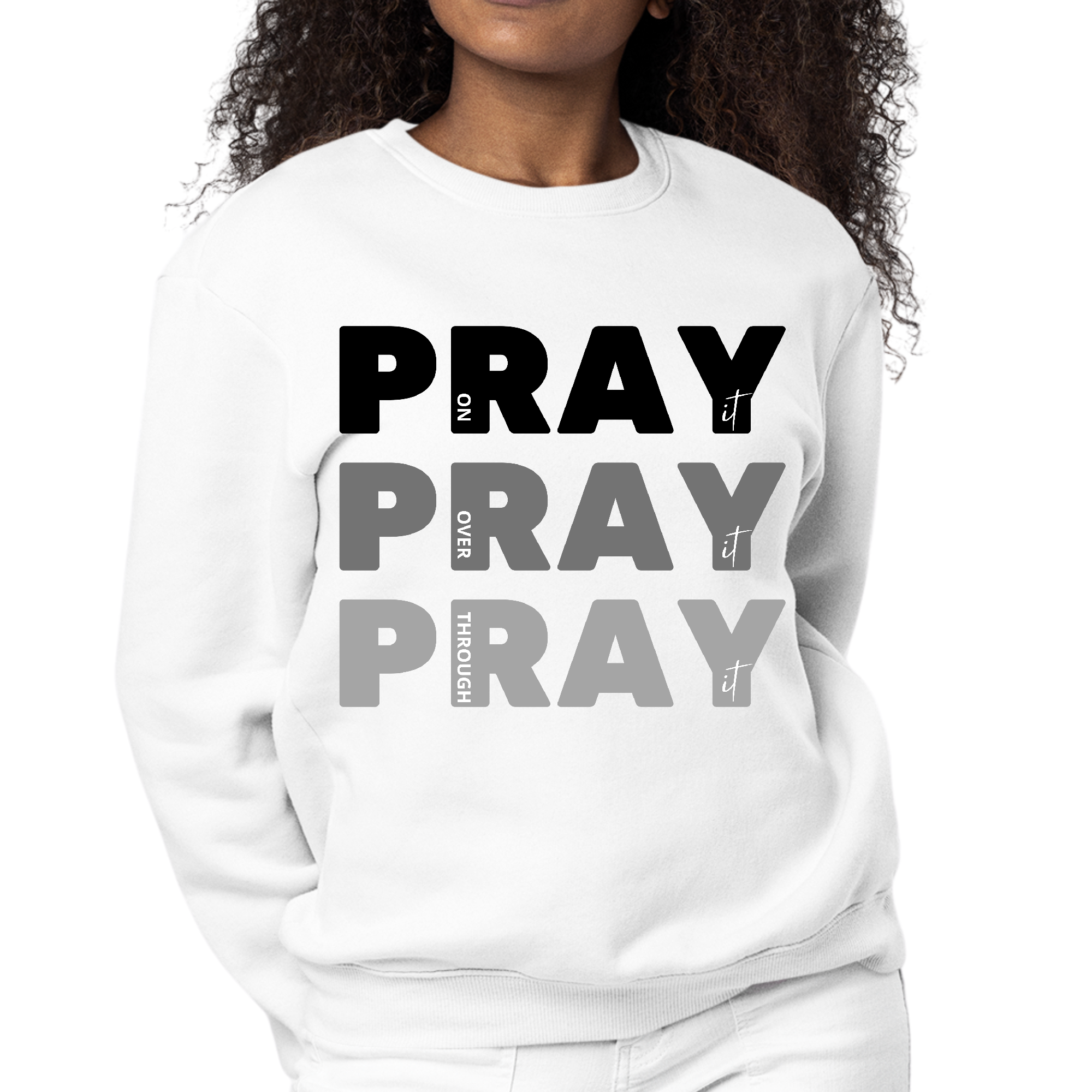 Women's black graphic sweatshirt with 'Pray On It Over It Through It' print, featuring long sleeves and a crewneck design.