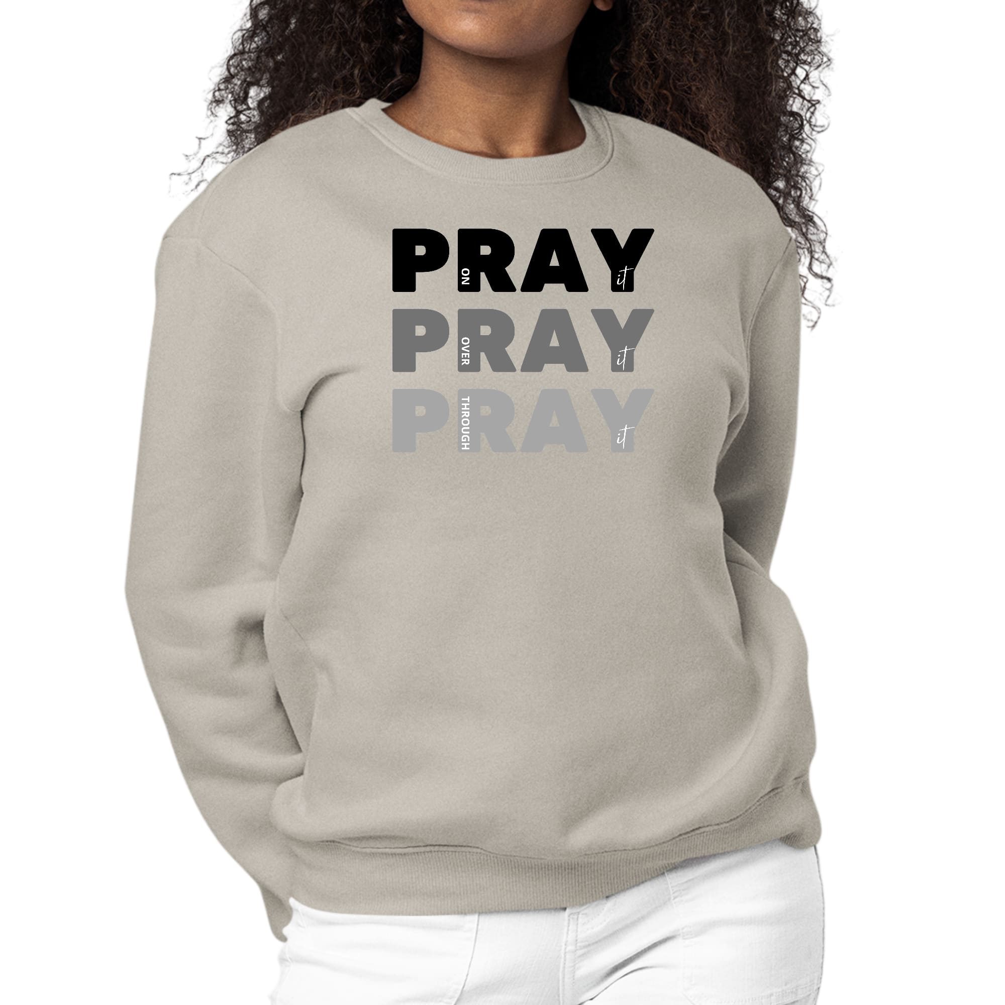 Women's black graphic sweatshirt with 'Pray On It Over It Through It' print, featuring long sleeves and a crewneck design.