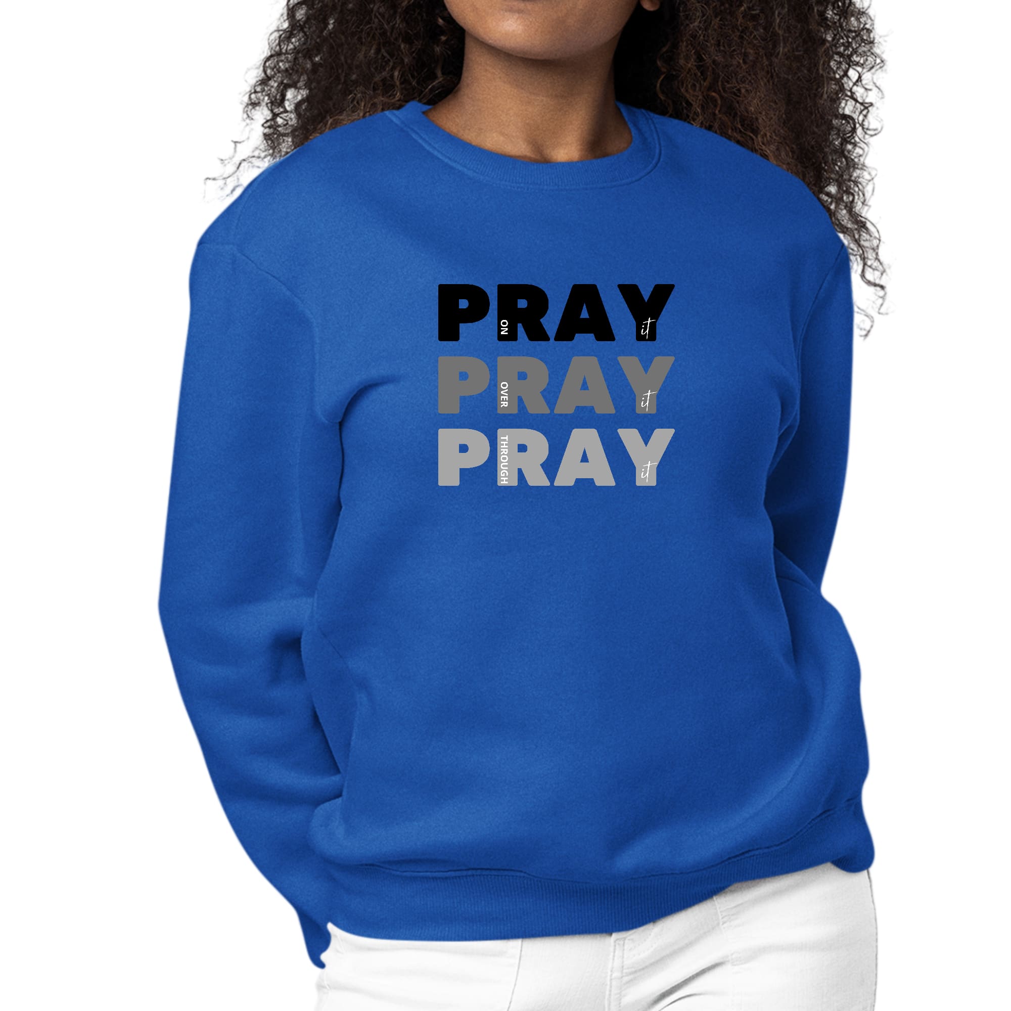 Women's black graphic sweatshirt with 'Pray On It Over It Through It' print, featuring long sleeves and a crewneck design.