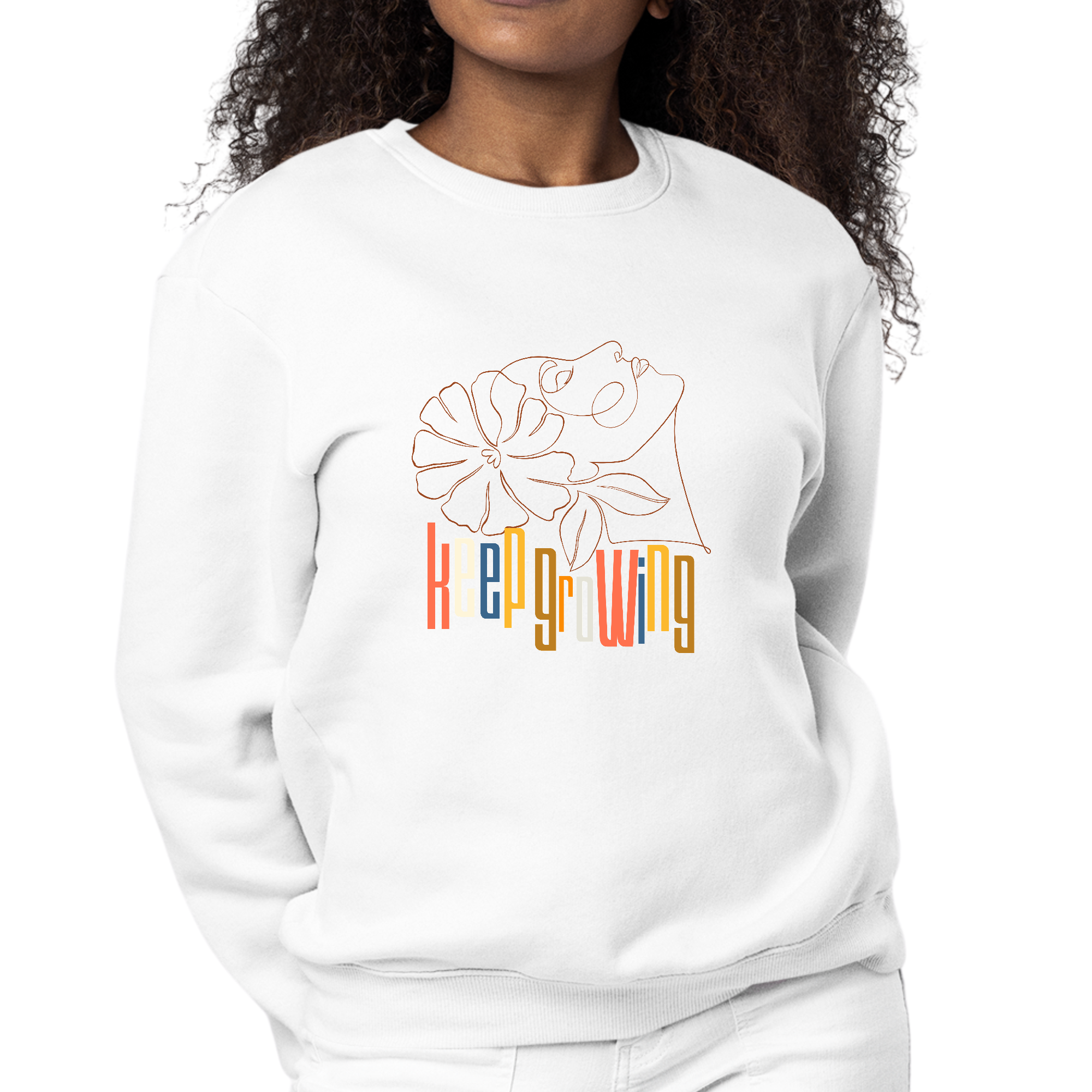 Womens Graphic Sweatshirt in pastel colors featuring floral line art and 'Keep Growing' text, showcasing a cozy pullover style.