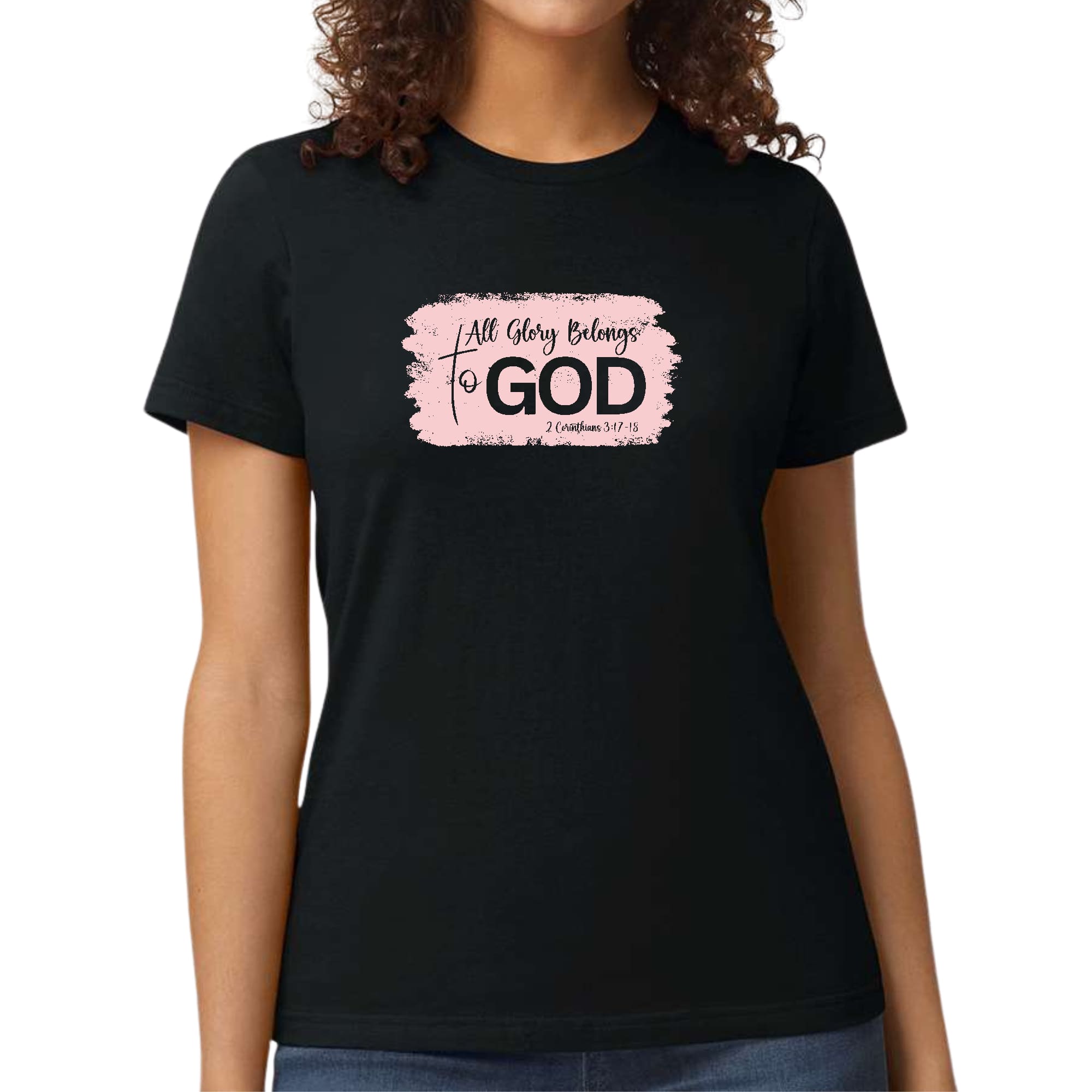 Light pink Women's Graphic T-shirt featuring 'All Glory Belongs to God' design, showcasing a modern and artistic style.