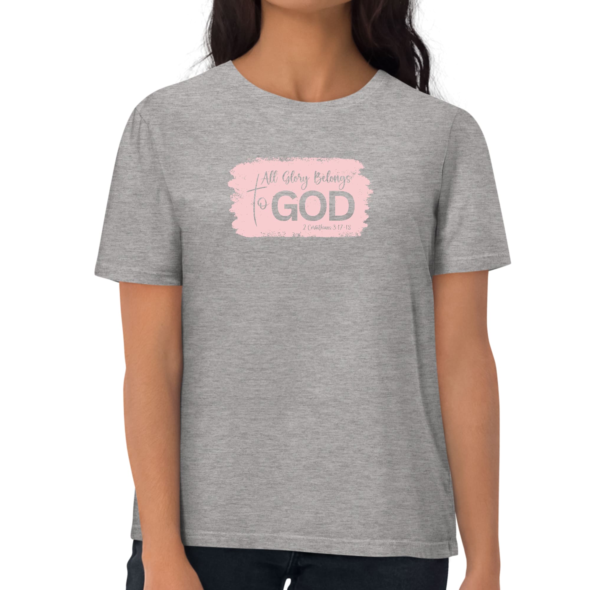 Light pink Women's Graphic T-shirt featuring 'All Glory Belongs to God' design, showcasing a modern and artistic style.