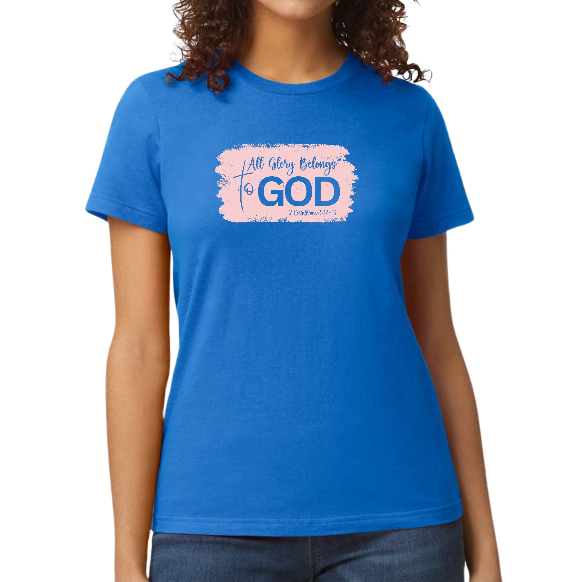 Light pink Women's Graphic T-shirt featuring 'All Glory Belongs to God' design, showcasing a modern and artistic style.