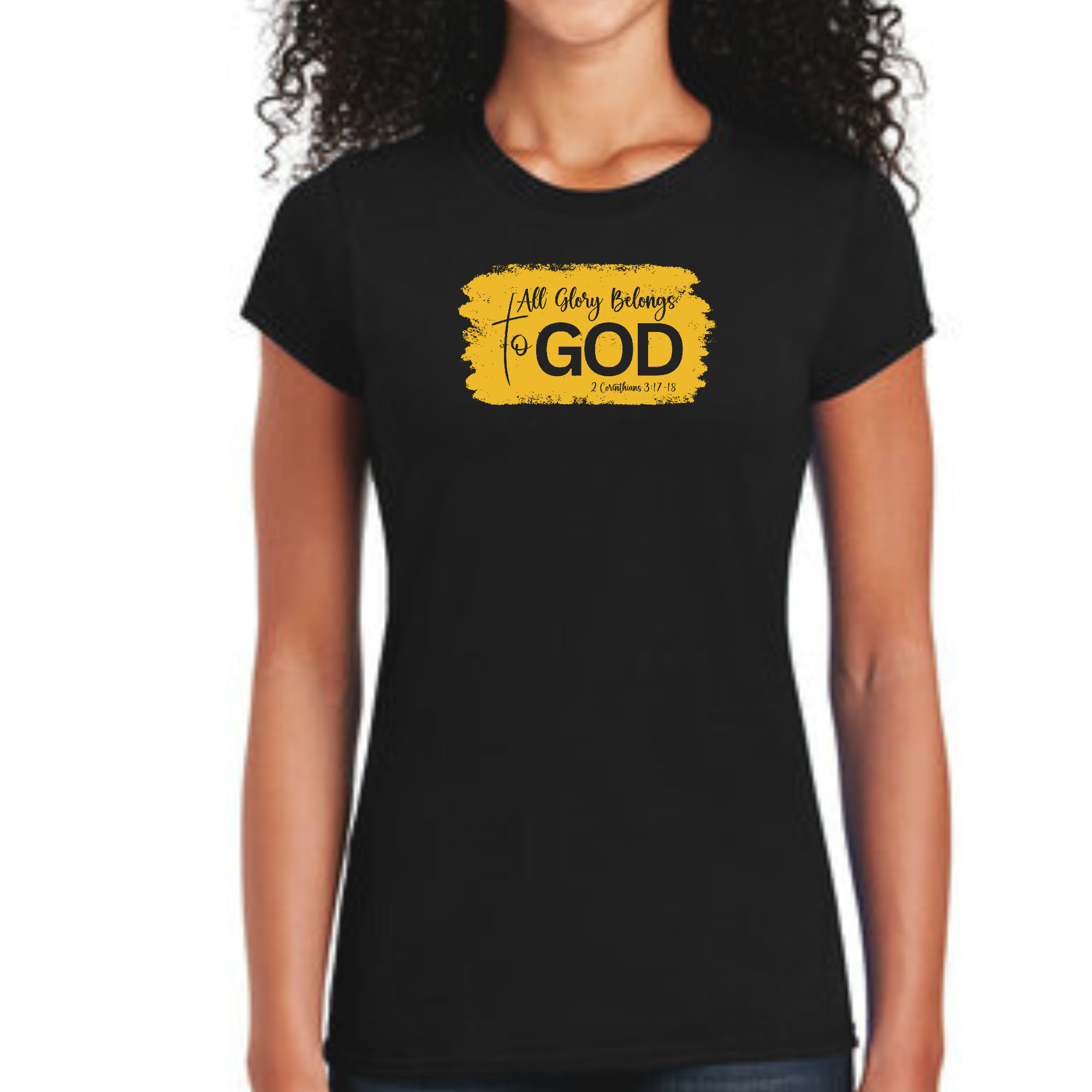 Women's golden yellow graphic t-shirt with 'All Glory Belongs to God' design, showcasing a modern and stylish look.