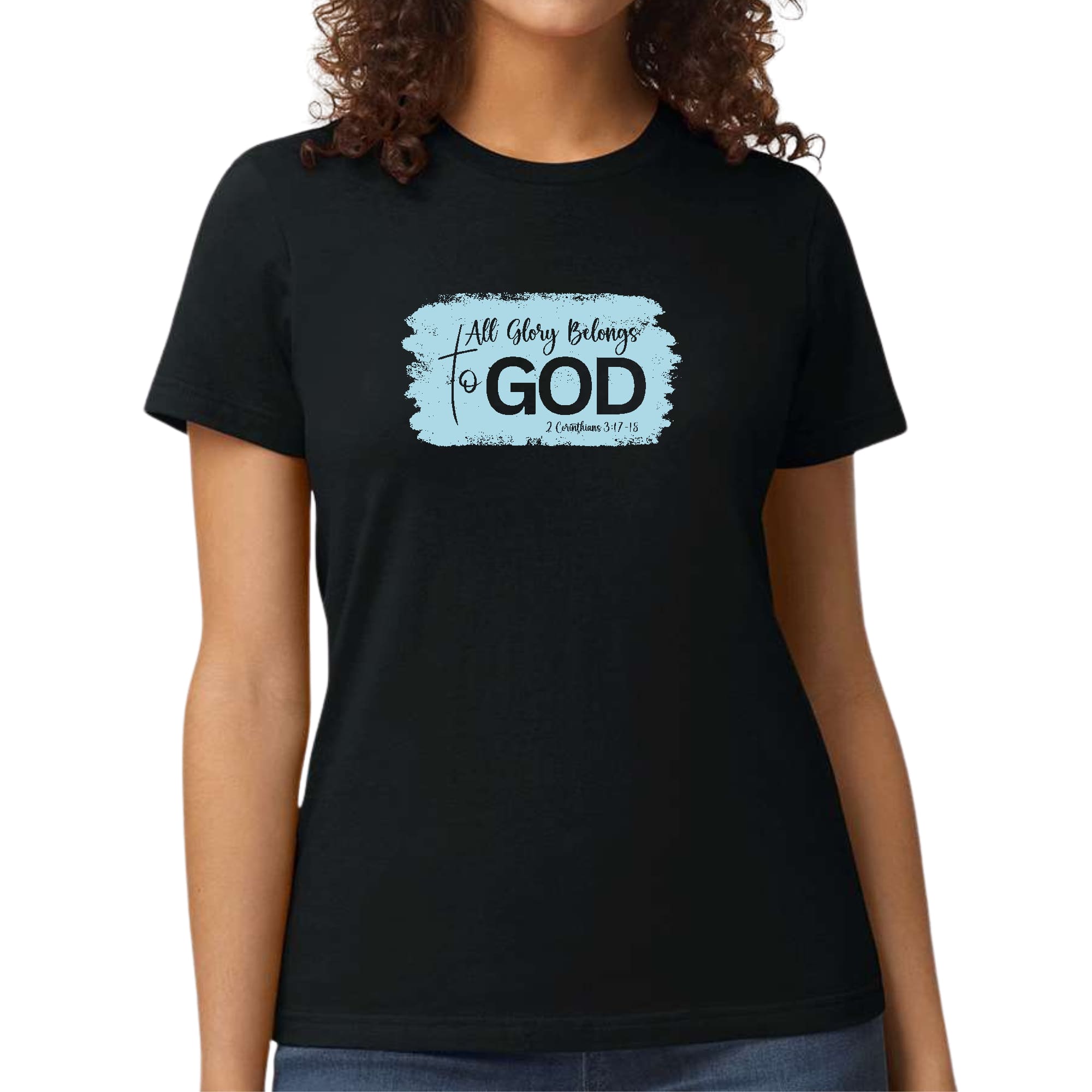 Light blue Women's Graphic T-shirt featuring 'All Glory Belongs to God' design, made from soft cotton fabric.