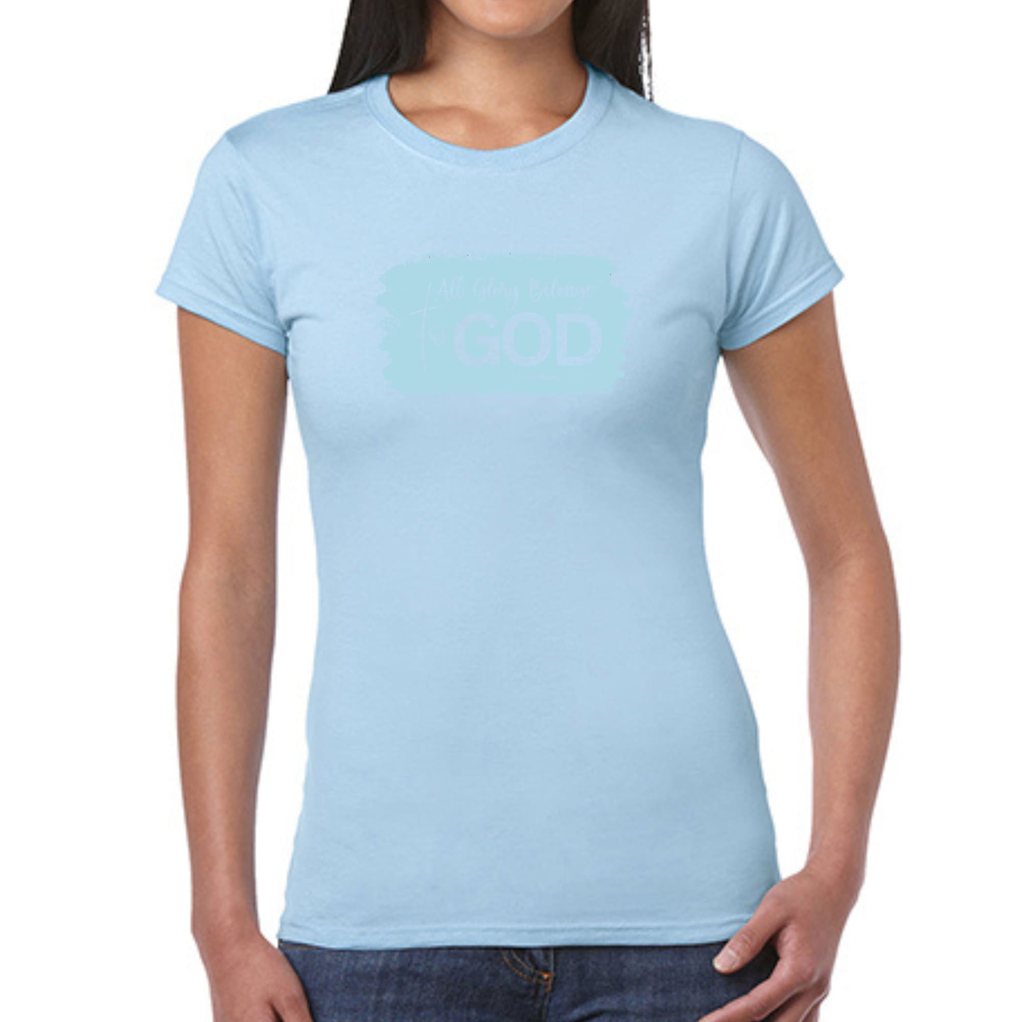 Light blue Women's Graphic T-shirt featuring 'All Glory Belongs to God' design, made from soft cotton fabric.