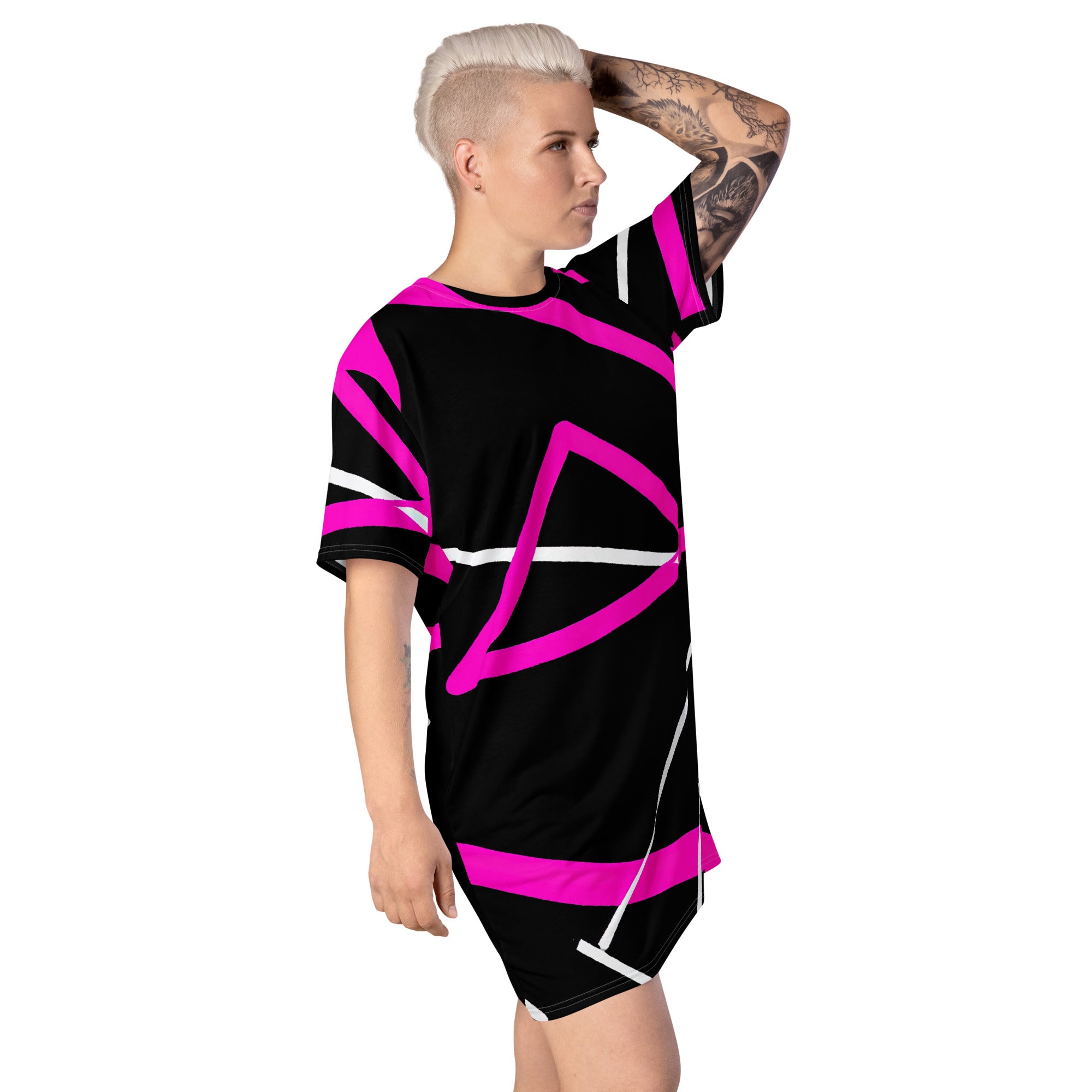 Womens Graphic T-shirt Dress featuring a stylish black and pink pattern, showcasing its comfortable oversized fit and relaxed design.